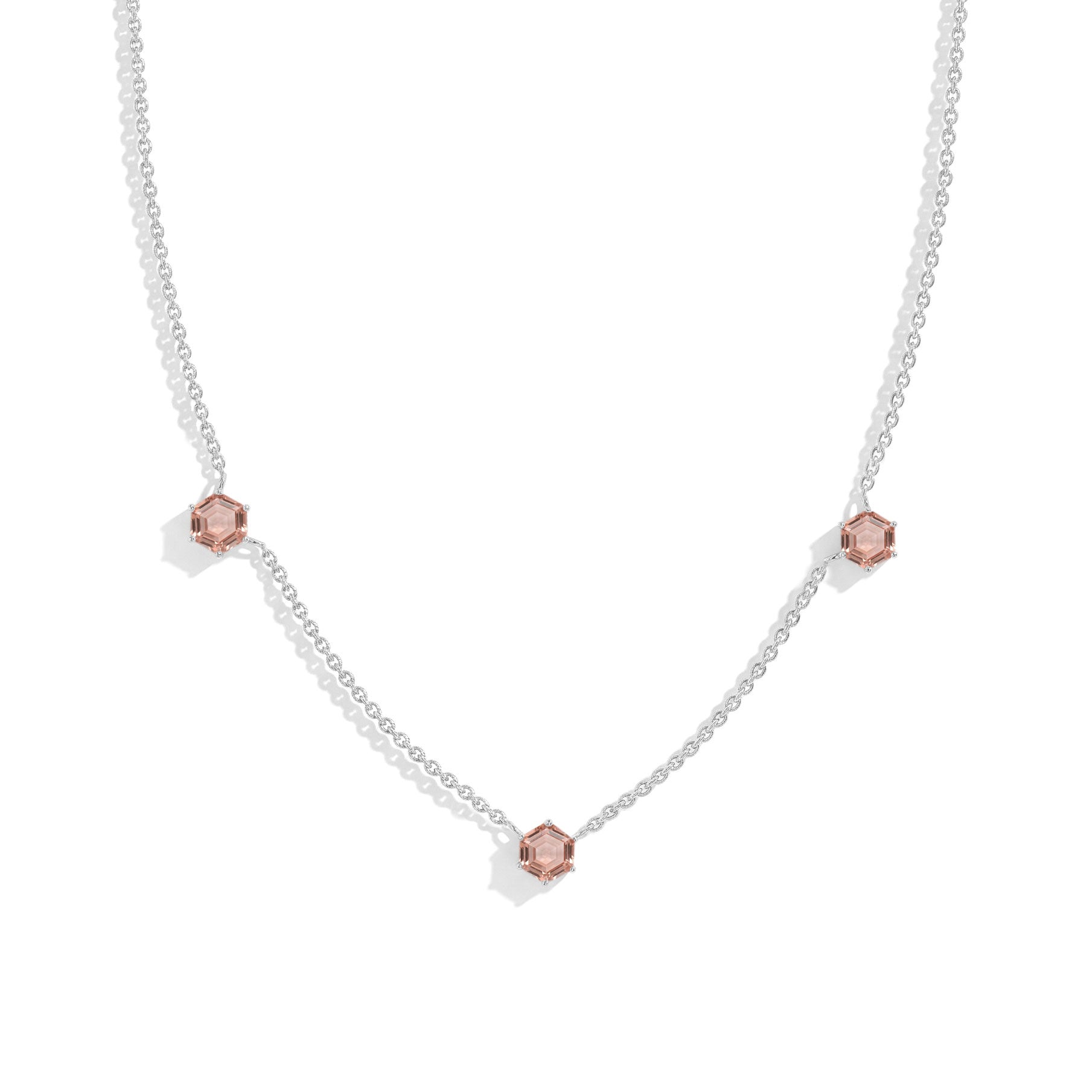 "Three stone morganite station necklace featuring hexagon cut gemstones in sterling silver
