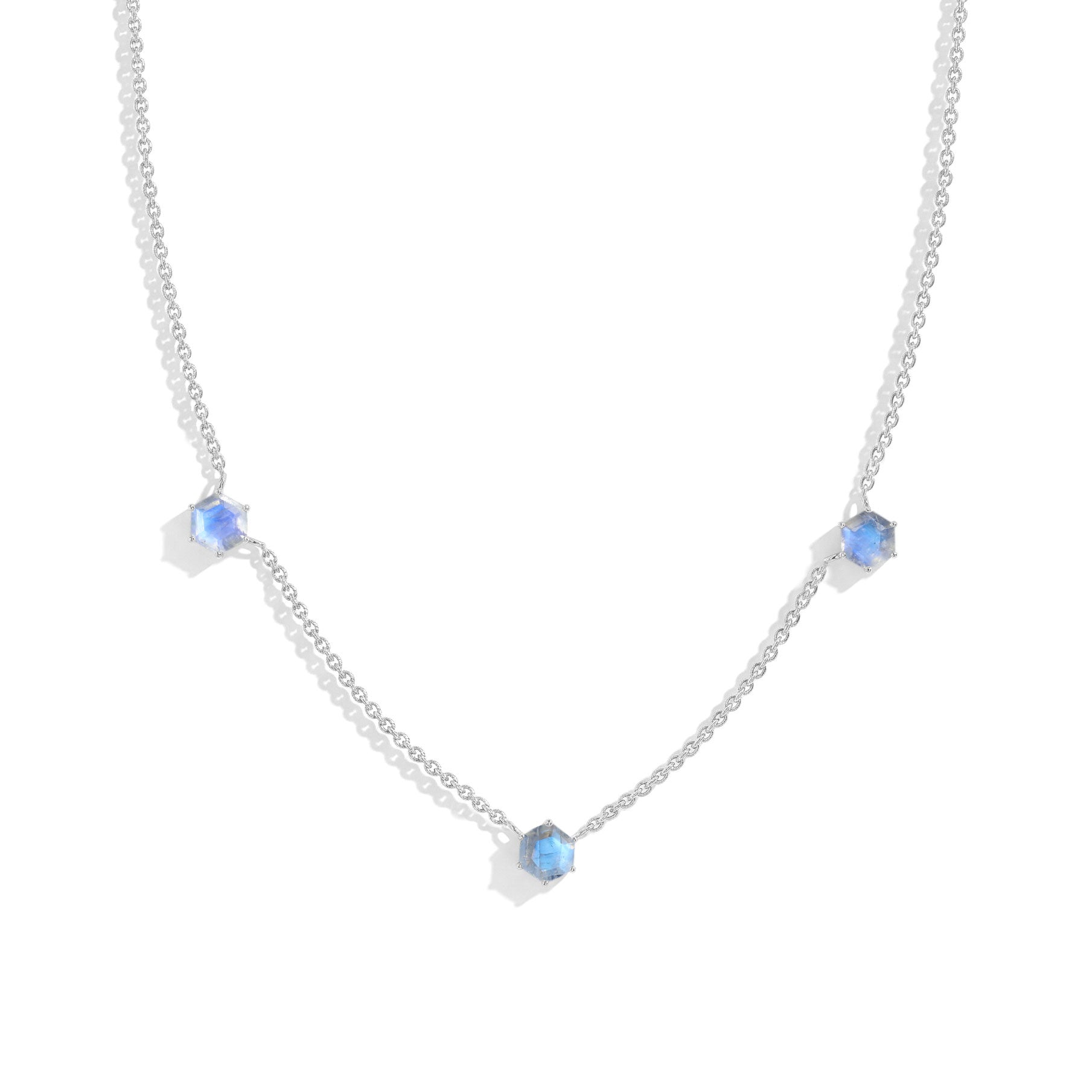 "Three stone moonstone station necklace featuring hexagon cut gemstones in sterling silver
