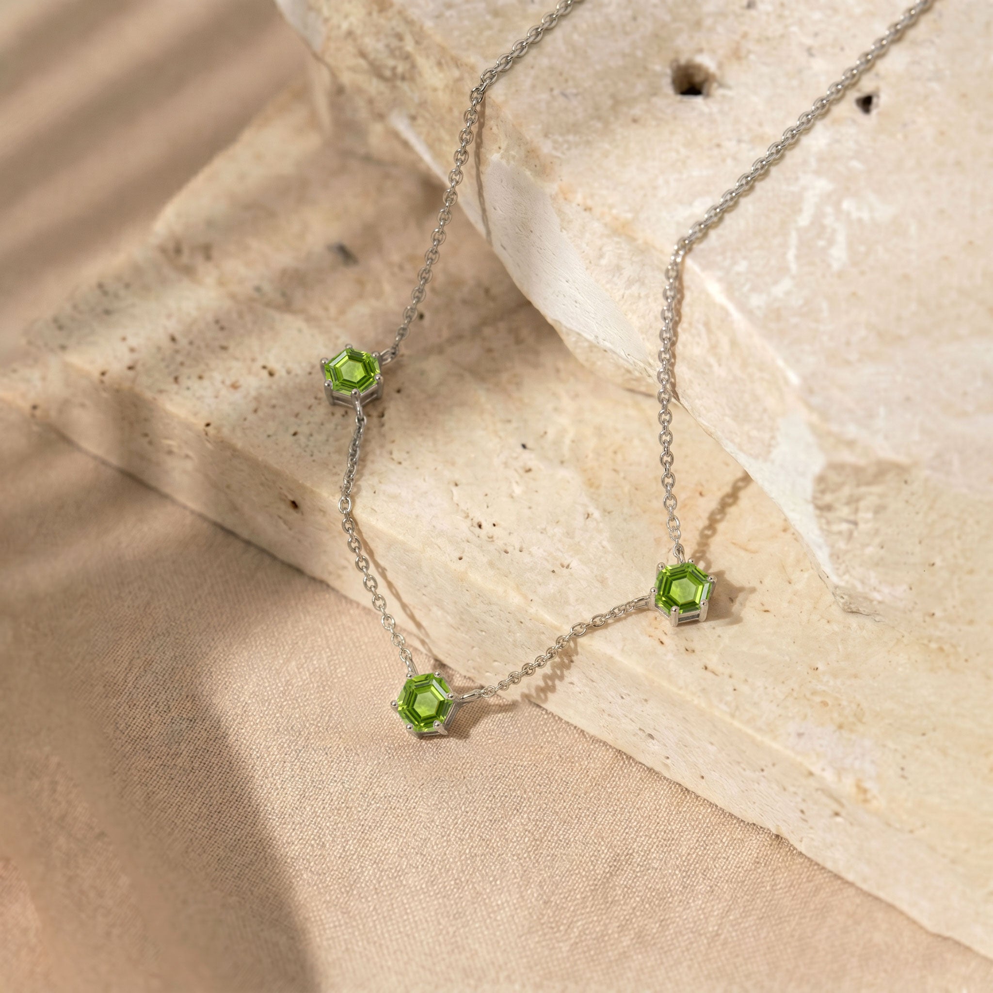 Natural peridot station necklace with three 6mm hexagon cut gemstones and extender chain
