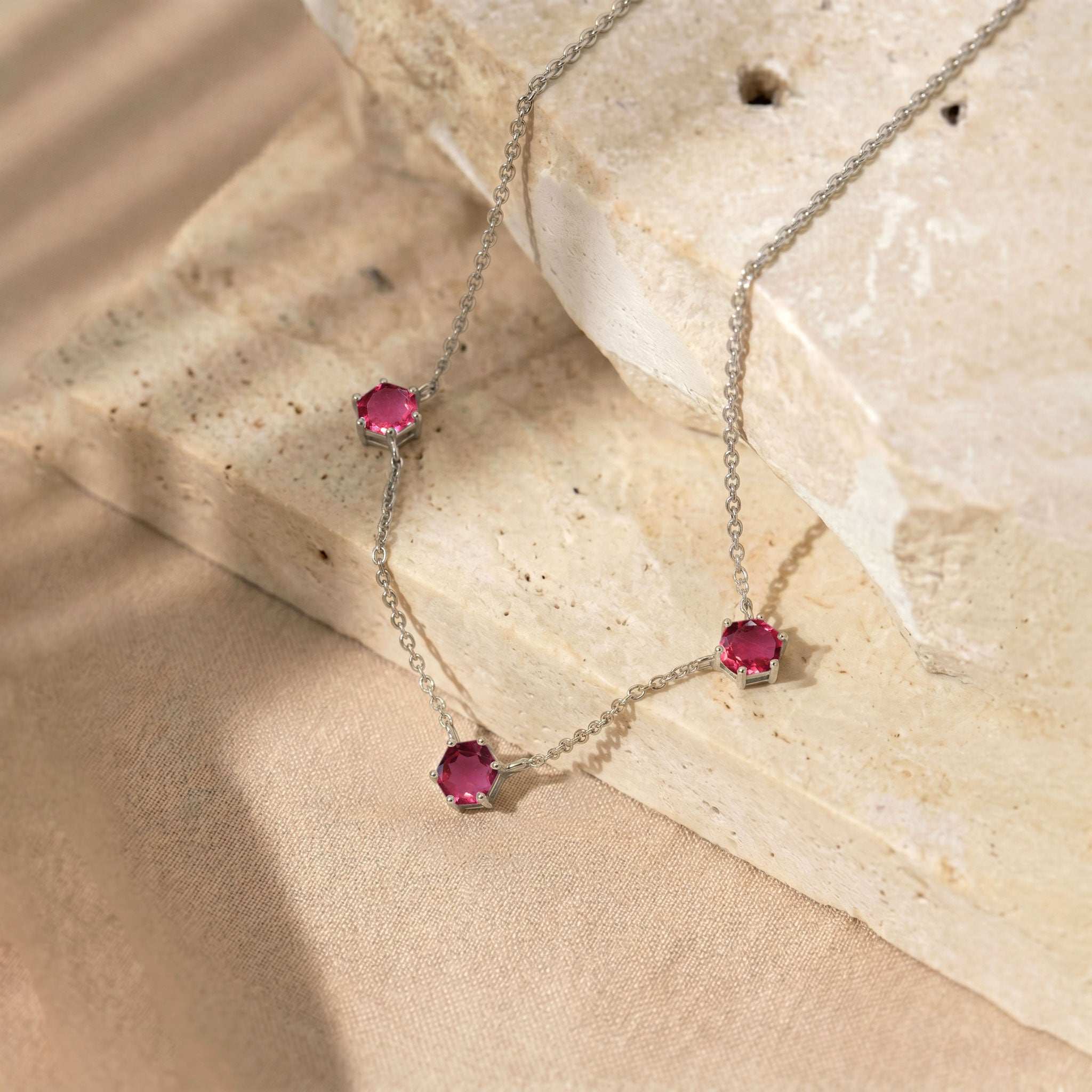 Pink tourmaline station necklace with three 6mm hexagon cut gemstones and extender chain
