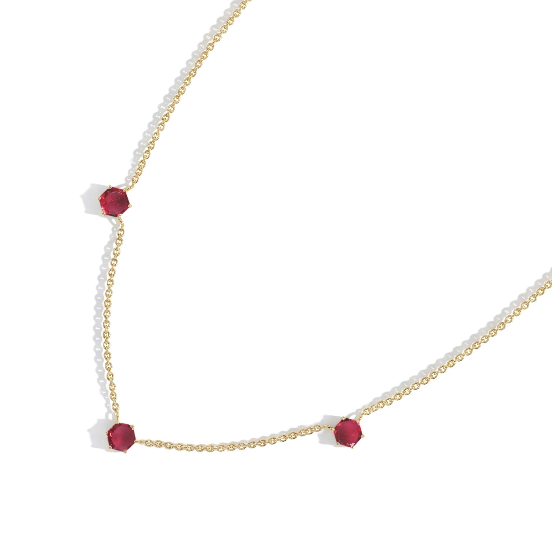 Modern three stone pink tourmaline station necklace with luxury jewelry styling"