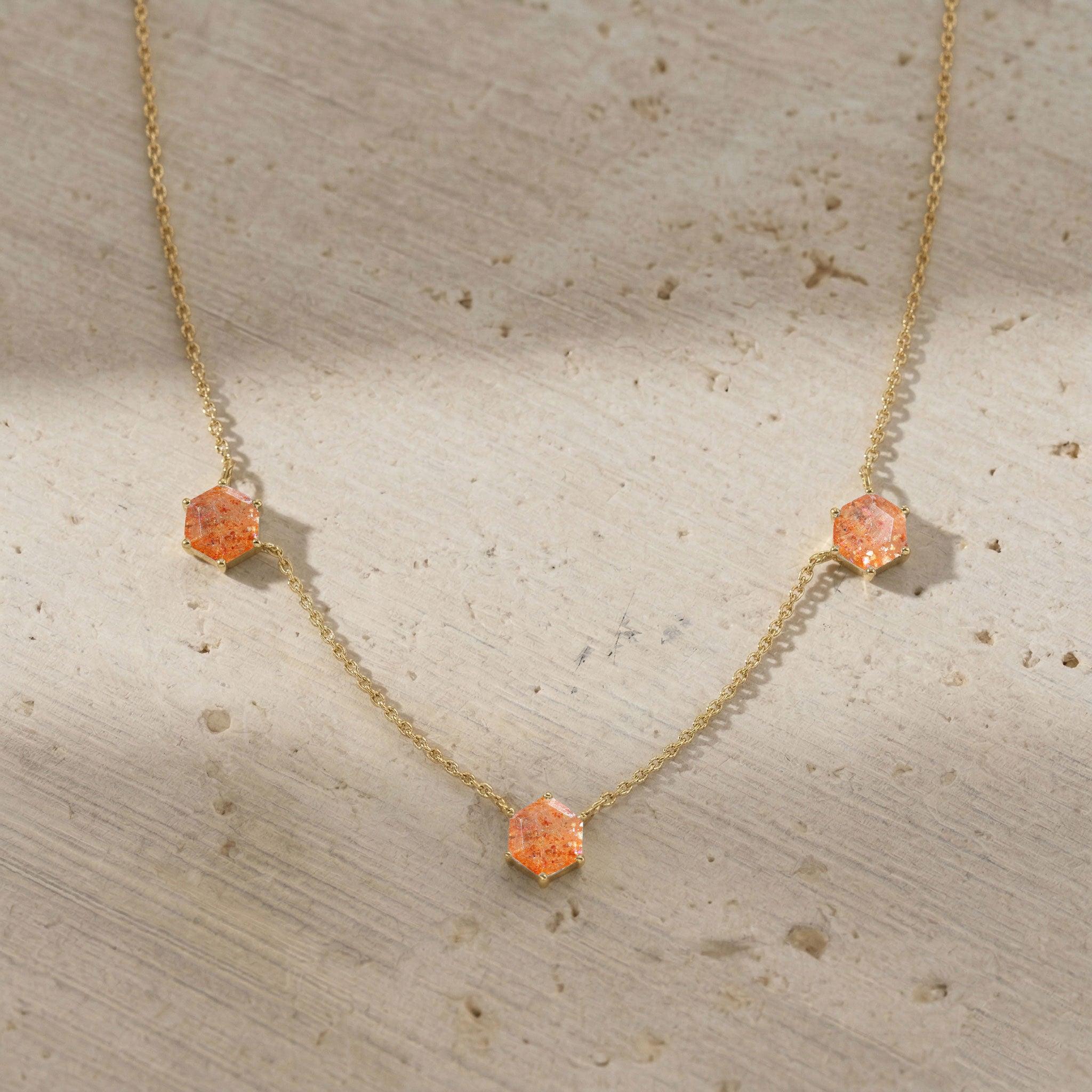 Orange sunstone gemstone necklace for women with three stone details
