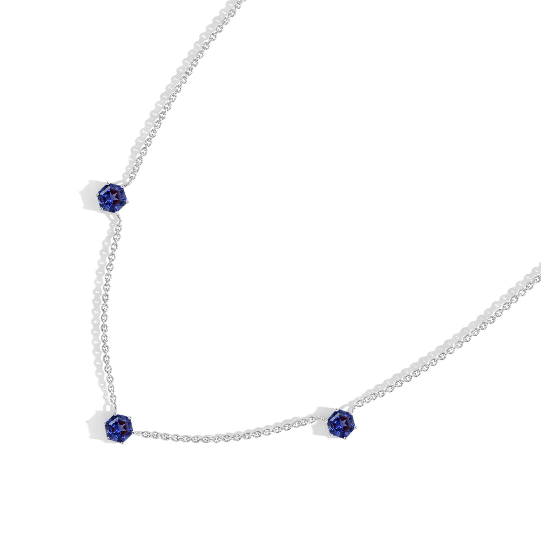 Elegant gemstone necklace with three hexagon Tanzanite stones for women.