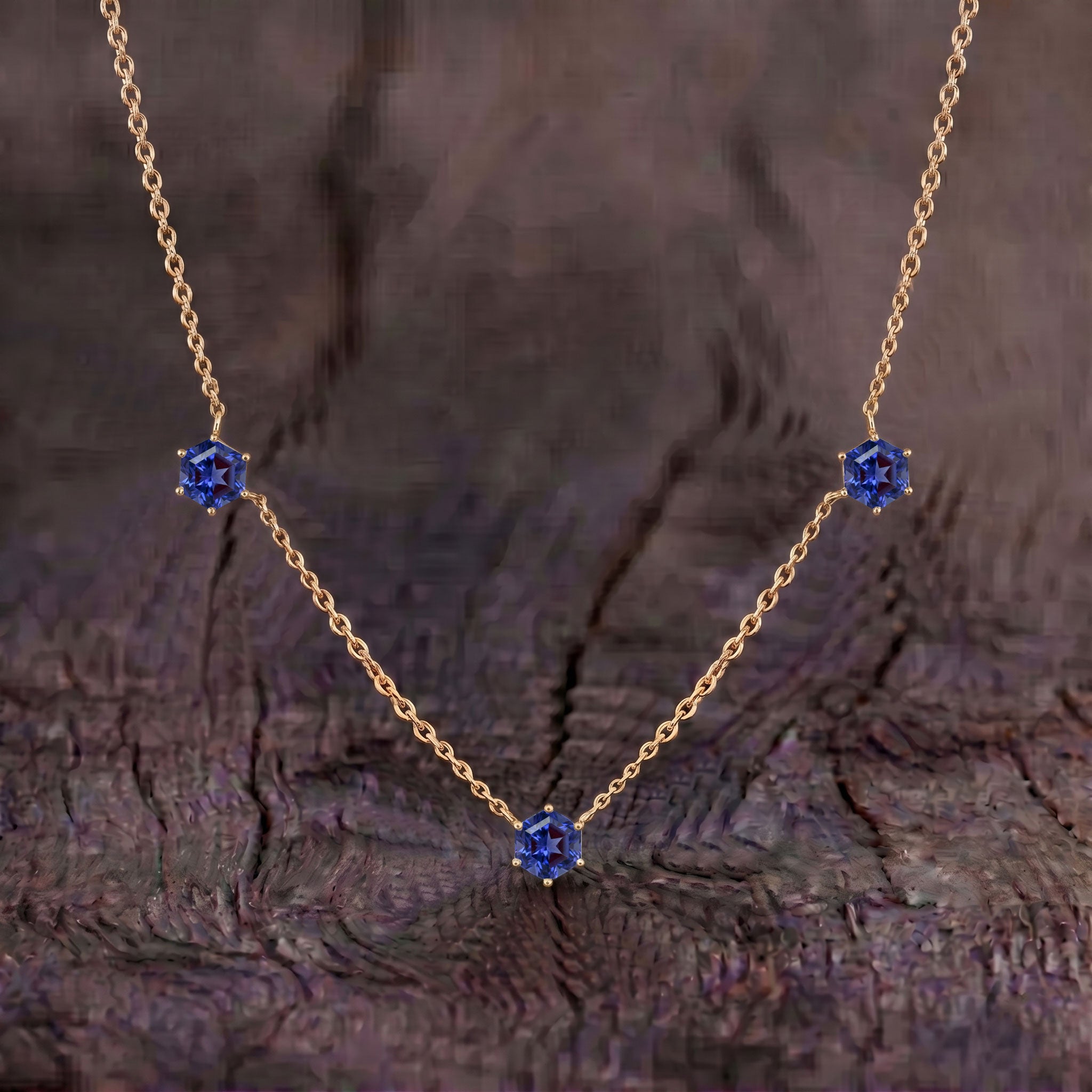 Delicate 16 inch Tanzanite station necklace with adjustable extender chain.