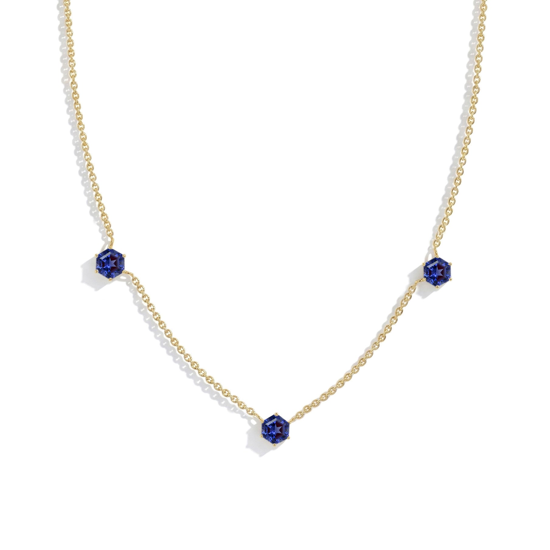 Handmade three stone Tanzanite necklace designed for everyday elegance.