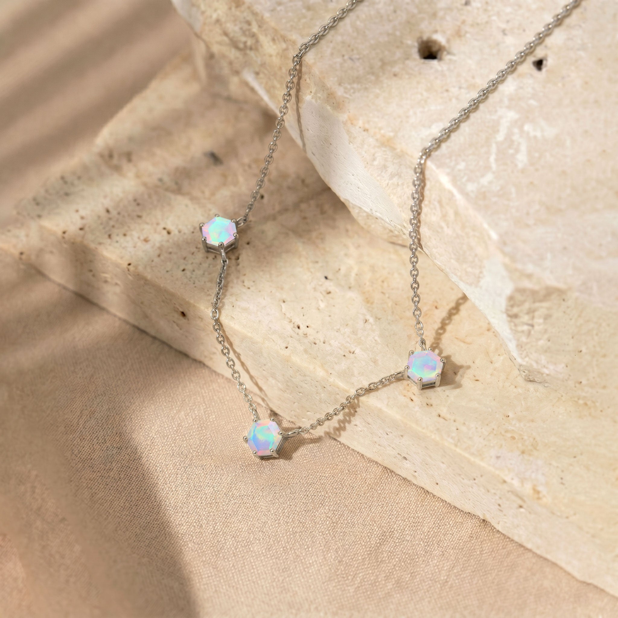 
Handmade three stone White Opal necklace for women with luxury finish.