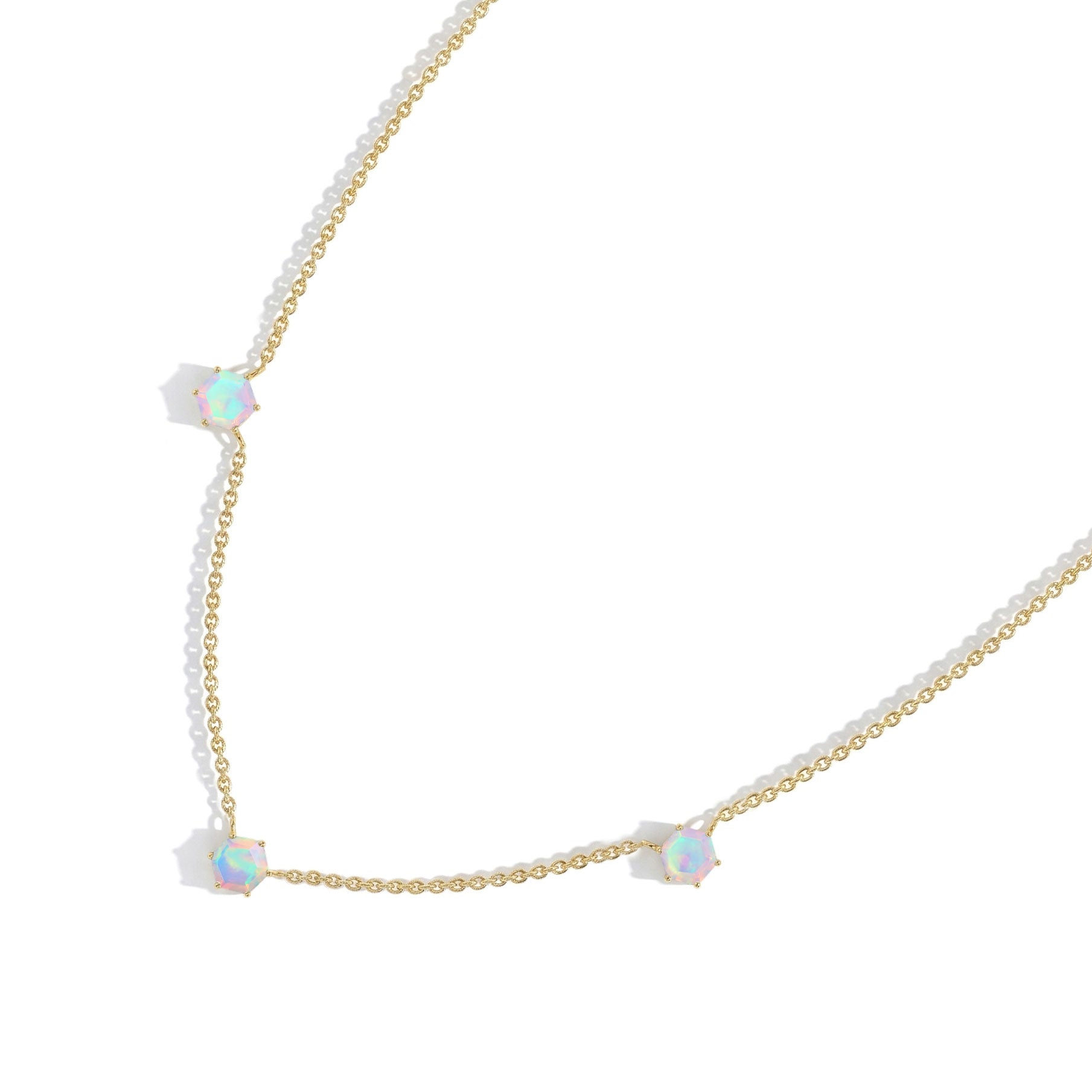 
White Opal geometric necklace crafted in yellow gold filled sterling silver.