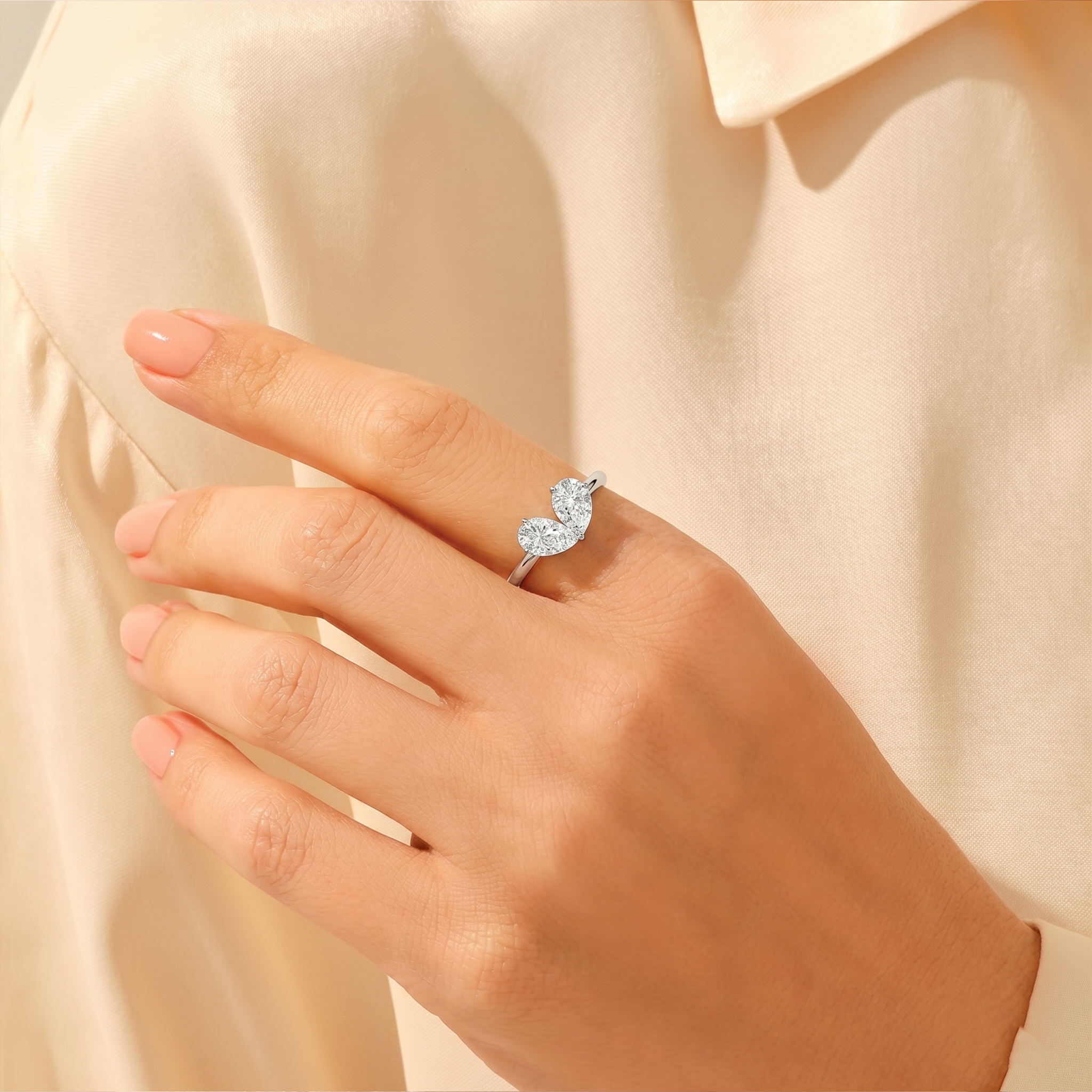 dainty pear cut moissanite, moissanite solitaire ring, pear moissanite on hand, solitaire ring on hand, elegant womens engagement band, moissanite promise band, dainty engagement ring, pear cut promise ring, womens moissanite ring, dainty promise band