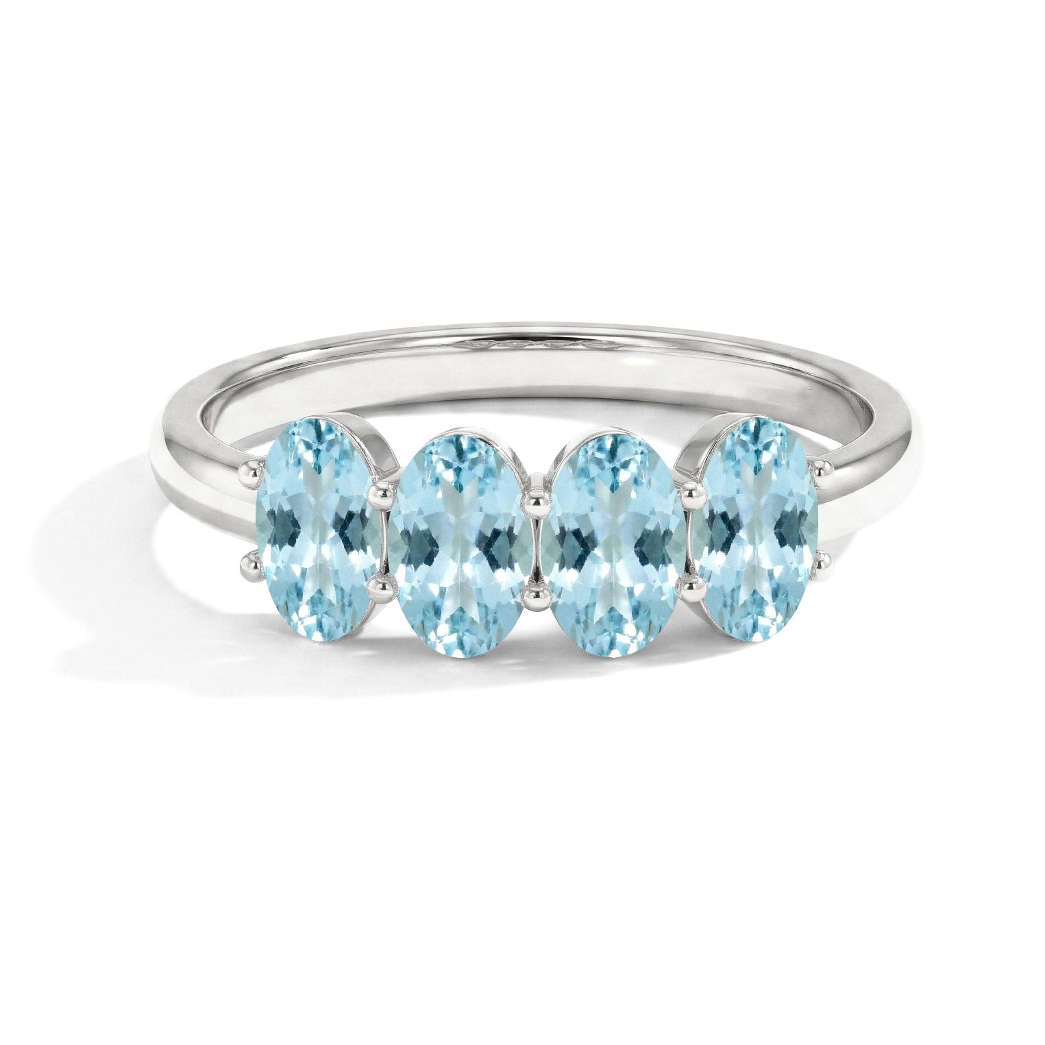 aquamarine ring, four stone ring, oval aquamarine, blue gemstone ring, March birthstone ring, sterling silver ring, elegant stacking ring, minimalist jewelry, dainty ring, gift for her, everyday jewelry, oval gemstone band
