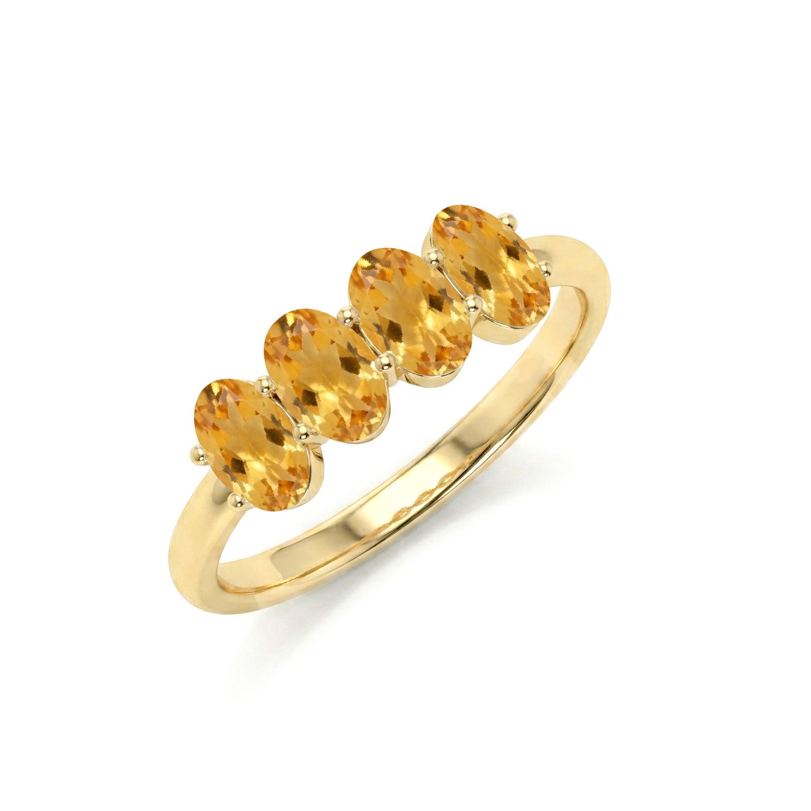 golden birthstone ring, genuine citrine jewelry, delicate oval gemstones, luxury handmade ring, fine artisan craftsmanship, stylish gemstone accessory, stacking fashion ring, elegant gift for her, modern band design, classic jewelry style