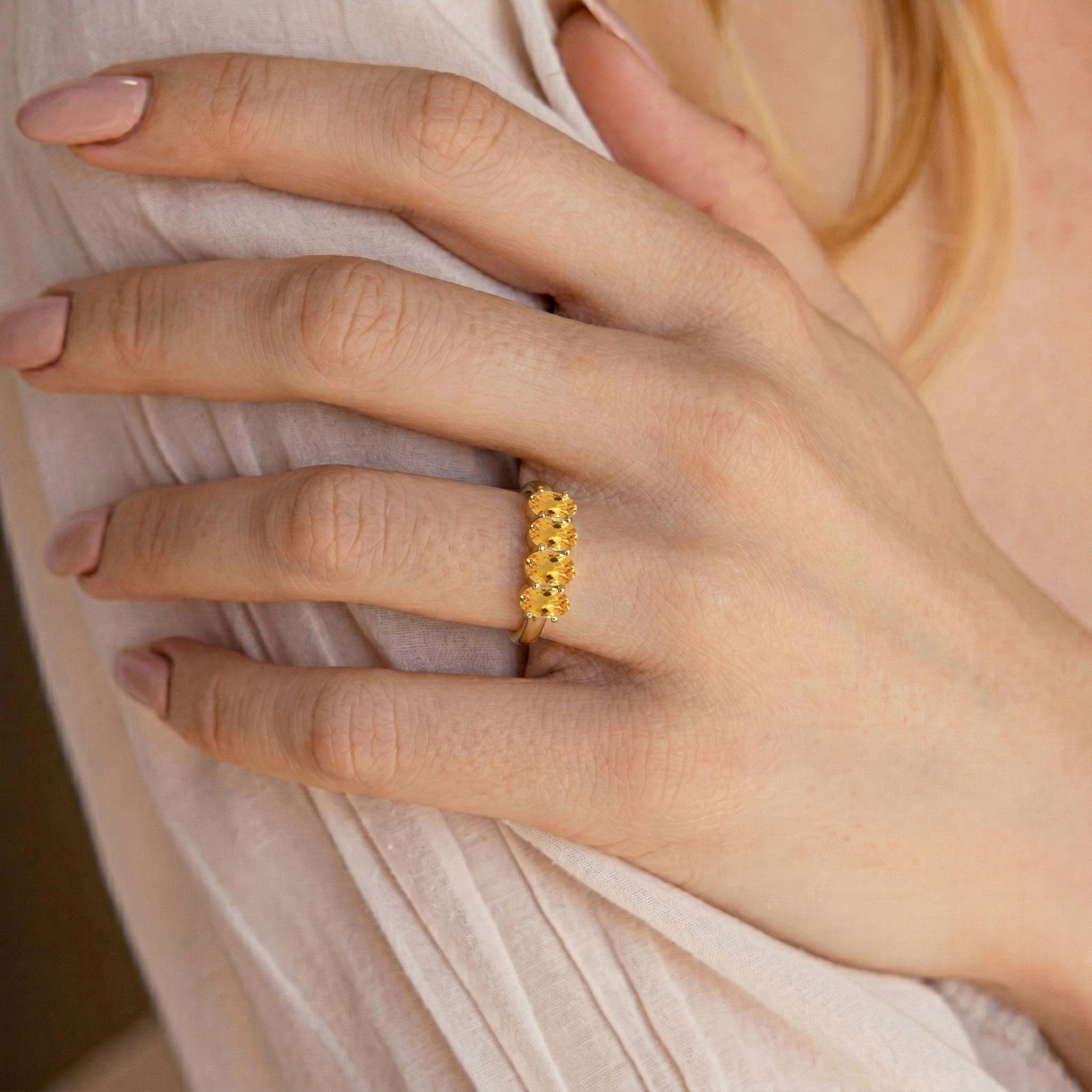 gold filled citrine ring, golden gemstone band, four oval gemstones, luxury birthstone jewelry, warm yellow crystal ring, modern fine jewelry, artisan gemstone ring, women's fashion ring, delicate ring design, anniversary jewelry