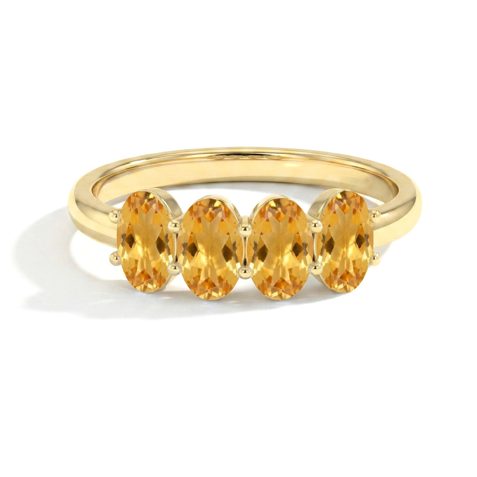 minimalist birthstone jewelry, natural citrine accessory, polished gemstone band, elegant women's ring, artisan gemstone craftsmanship, oval faceted stones, stylish fine jewelry, contemporary ring design, anniversary gift idea, premium quality jewelry