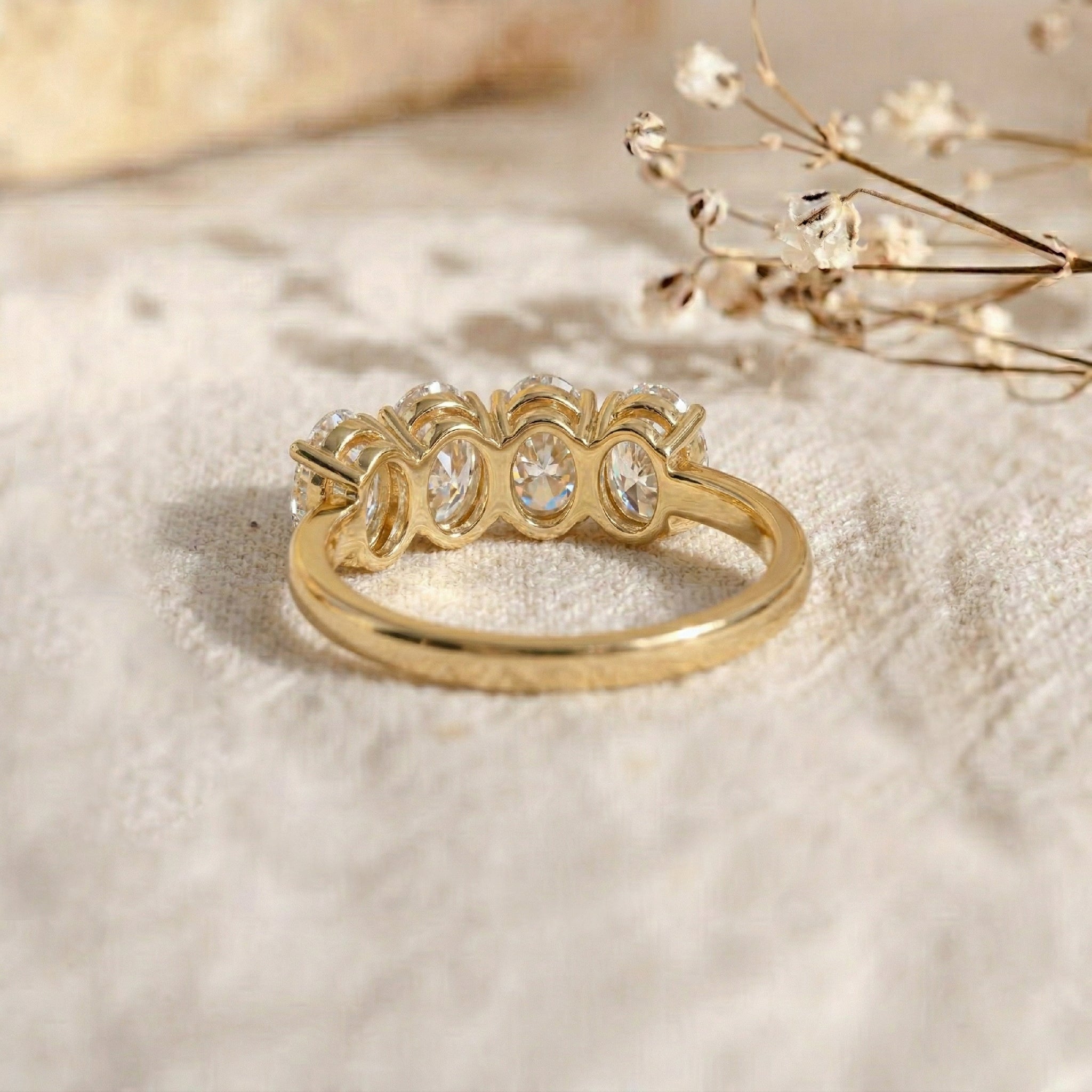 four oval gemstones, sparkling jewellery, elegant ring for women, timeless gemstone accessory, artisan craftsmanship, polished luxury band, sophisticated fashion jewellery, bridal ring style, gift for her, everyday ring, statement jewellery, premium sparkle