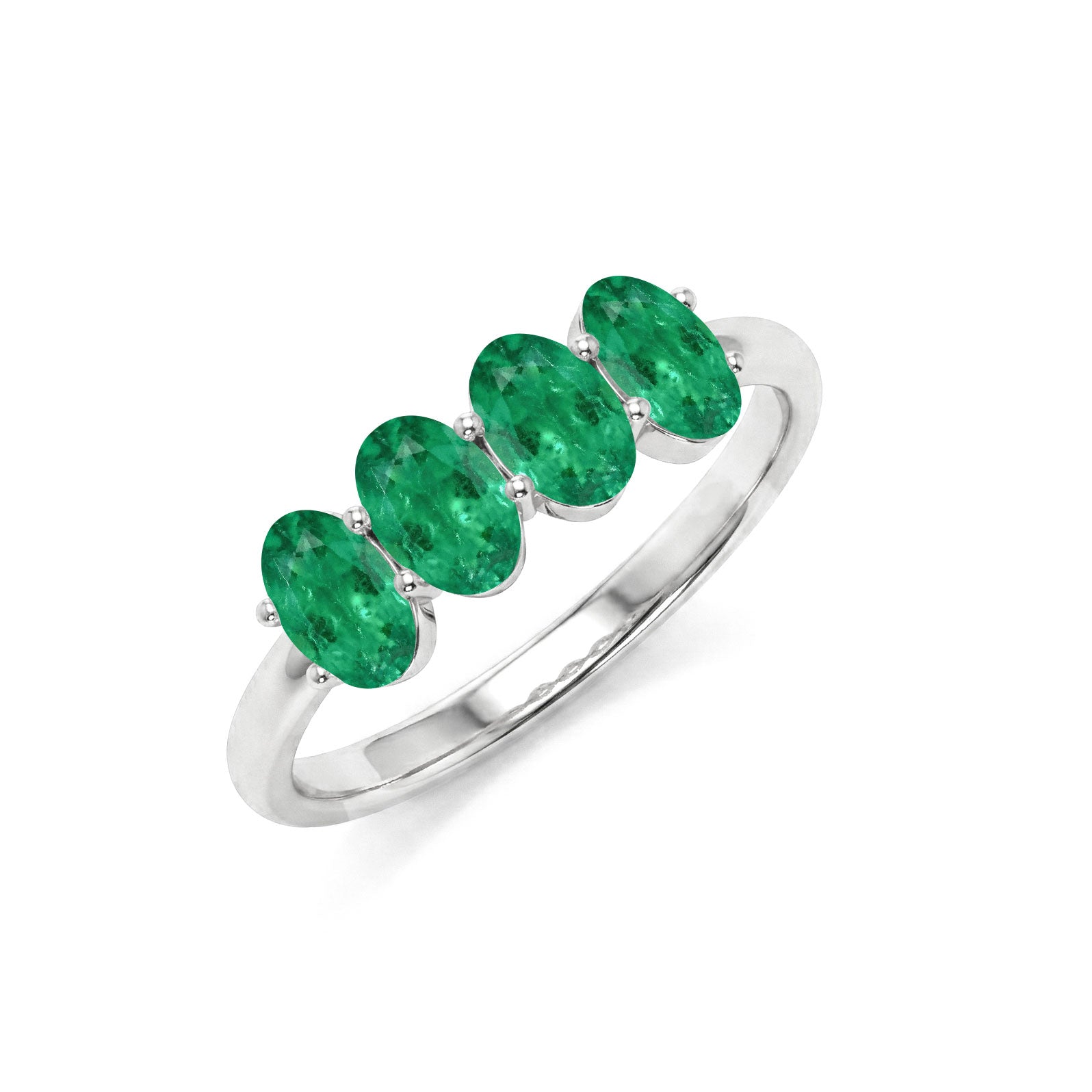 emerald promise ring, oval gemstone fashion, handcrafted stacking jewelry, modern minimalist band, green luxury accessory, elegant anniversary jewelry, timeless ring design, polished finish, women's gemstone gift, refined everyday jewelry, artisan craftsmanship, sophisticated style