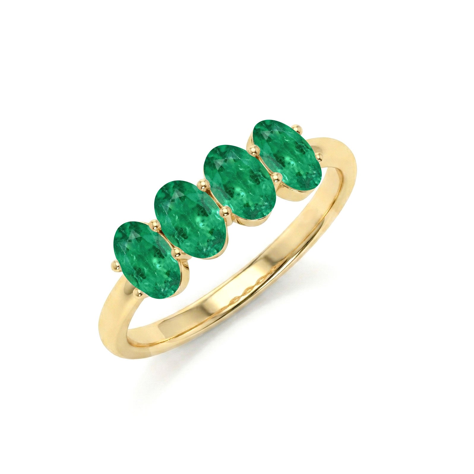green gemstone statement ring, four emerald stones, refined oval jewelry, artisan made ring, bridal fashion accessory, anniversary keepsake jewelry, elegant stacking accessory, timeless gemstone band, premium craftsmanship, sophisticated gift, everyday elegance, luxury design