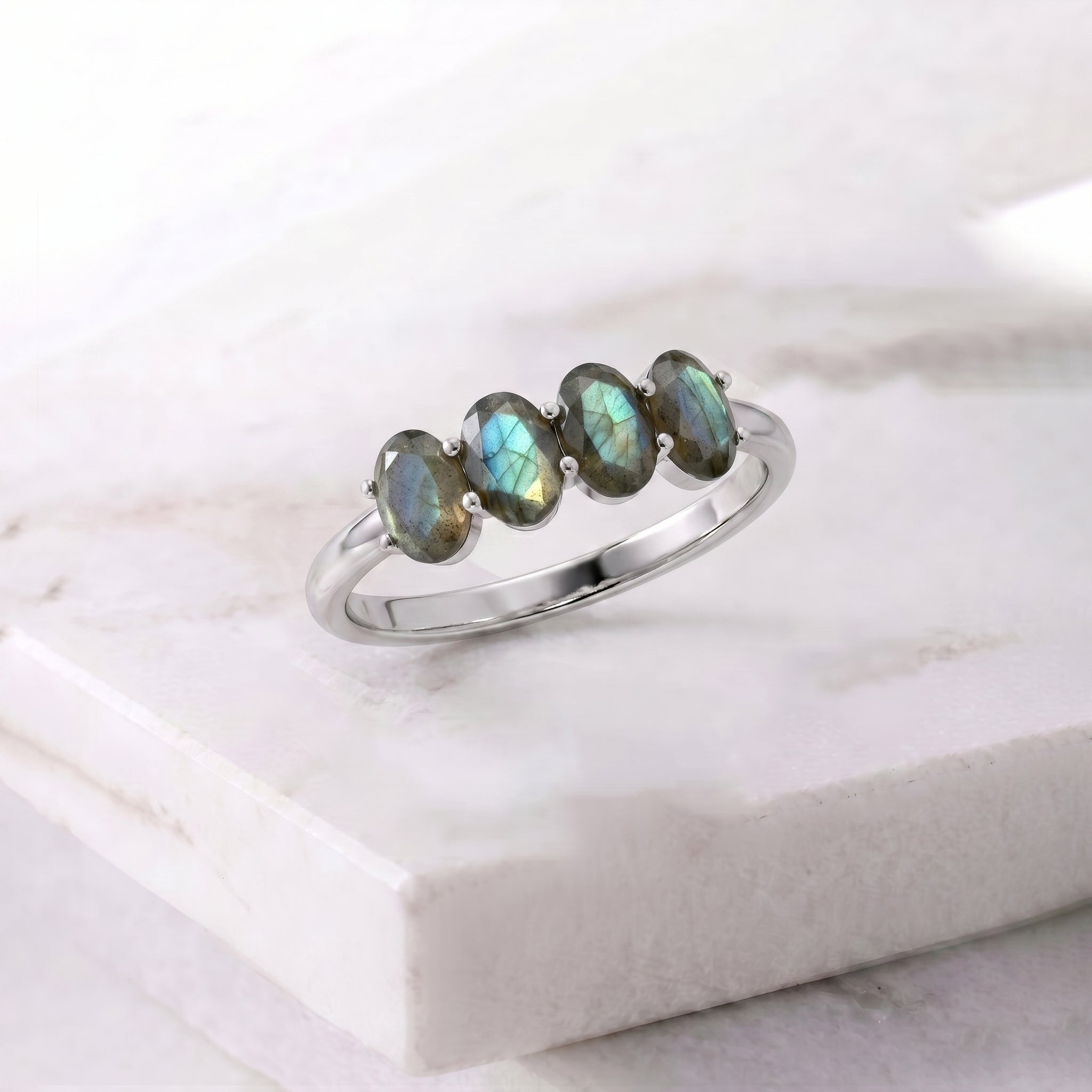 Gold Labradorite ring, oval cut gemstone, modern ring, artisan craftsmanship, iridescent stone, luxury accessory, stackable jewelry, unique design, fashion ring, gift