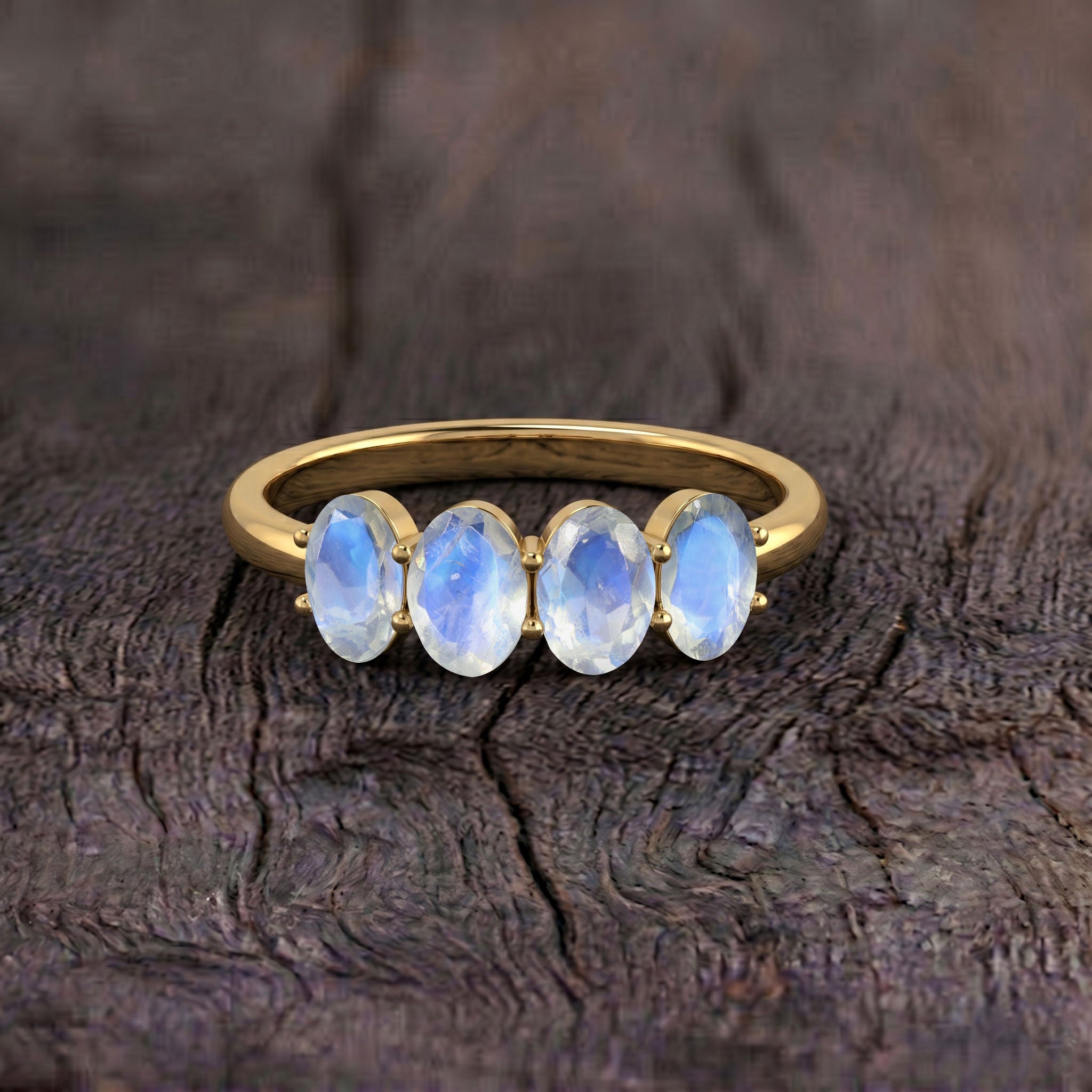 Macro photography of Genuine Moonstone Ring, oval natural moonstones with beautiful blue sheen, secure prong setting, polished sterling silver band, handcrafted artisan jewelry, luxury moonstone ring, fine gemstone craftsmanship, stackable ring, June birthstone jewelry, premium women's jewelry, elegant minimalist design with exceptional gemstone brilliance