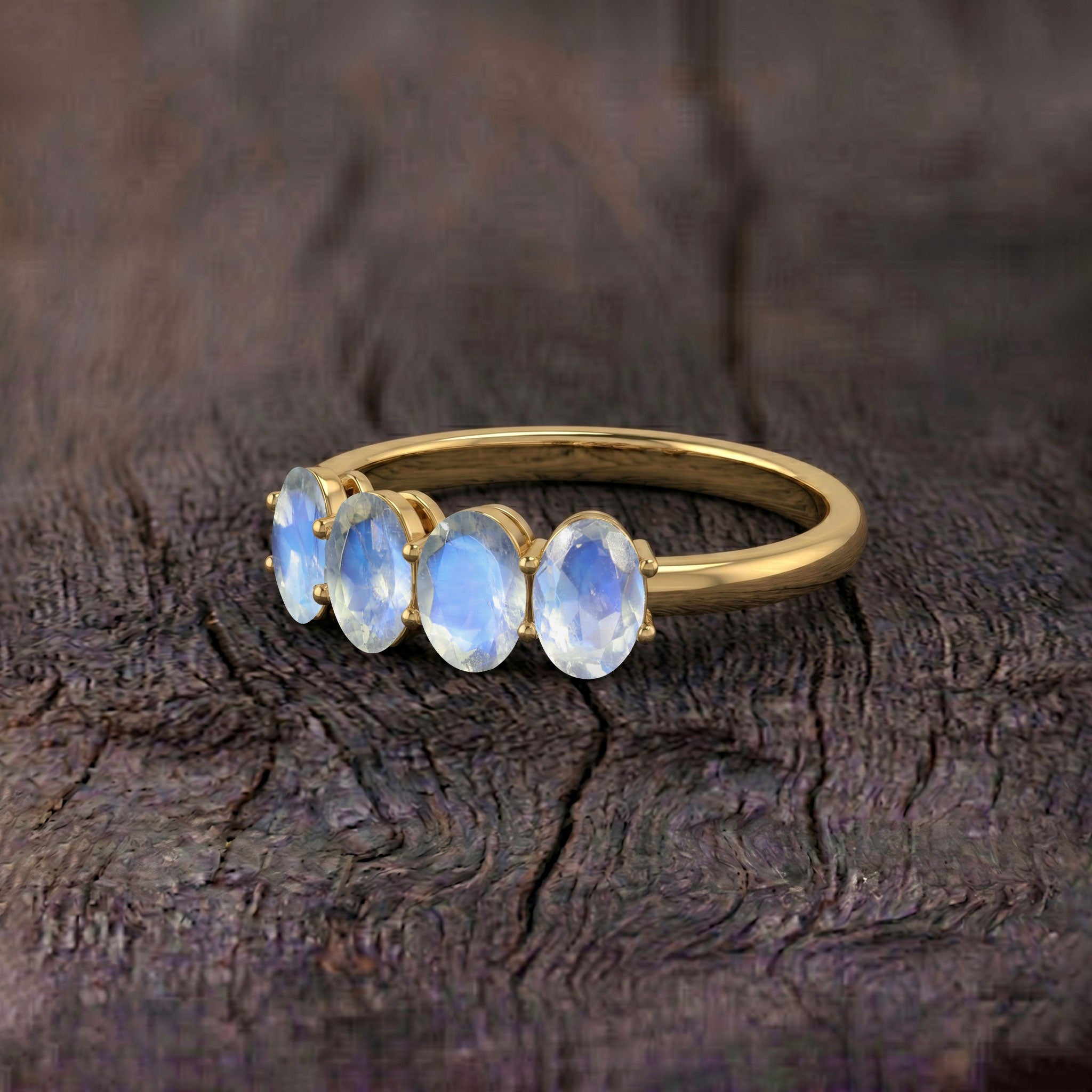 Moonstone Ring styled on marble background with luxury accessories, genuine natural moonstones, blue flash gemstone jewelry, handcrafted 925 Sterling Silver ring, elegant stackable ring, fine artisan craftsmanship, June birthstone jewelry, premium fashion accessory, sophisticated minimalist jewelry, timeless luxury ring for women with polished finish