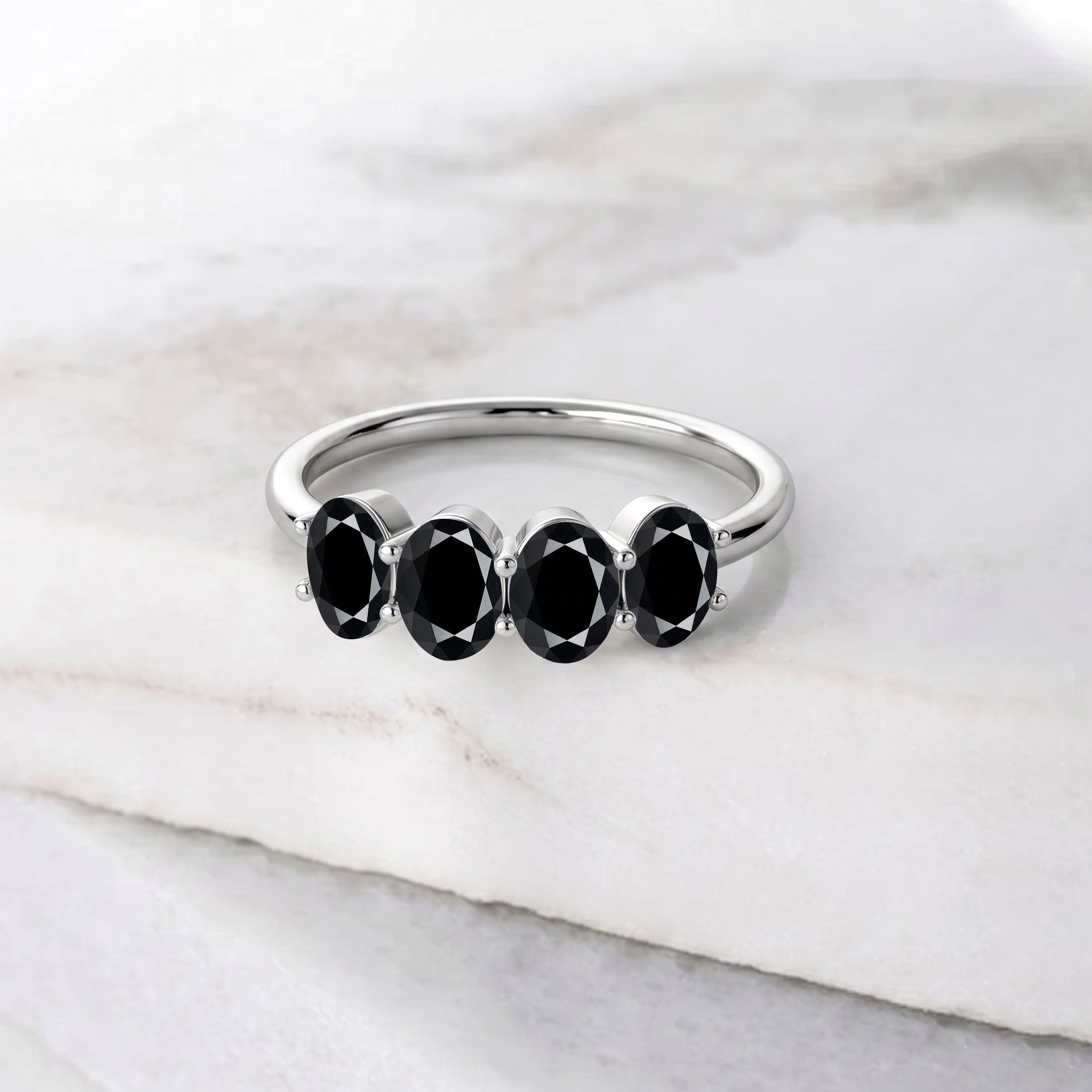 oval black onyx ring, modern gemstone band, handcrafted accessory, minimalist jewelry, polished gemstone ring, elegant black jewelry, stylish ring, everyday wear, fashion accessory, timeless gift