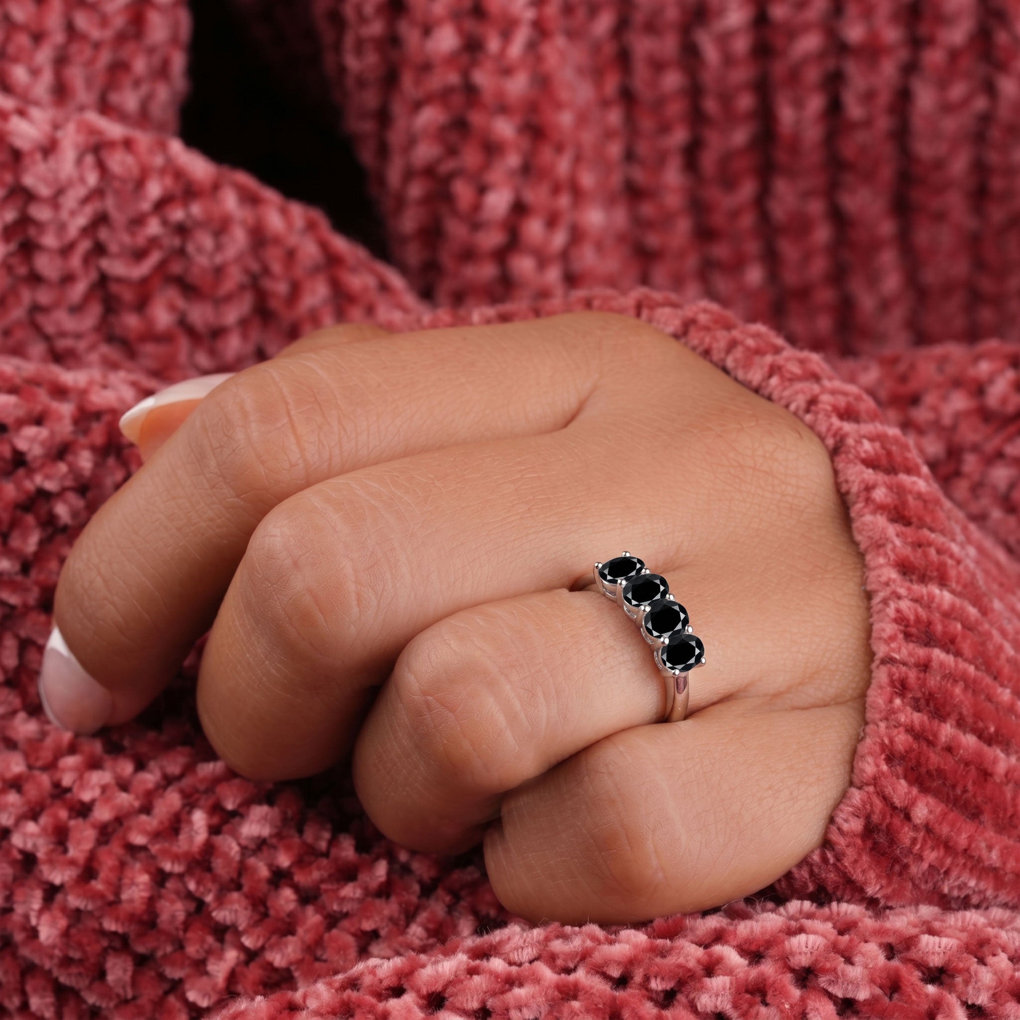 minimalist black onyx ring, elegant gemstone jewelry, polished oval stones, artisan crafted ring, stackable jewelry, timeless ring design, sophisticated jewelry, women's ring, fine accessory, luxury gift