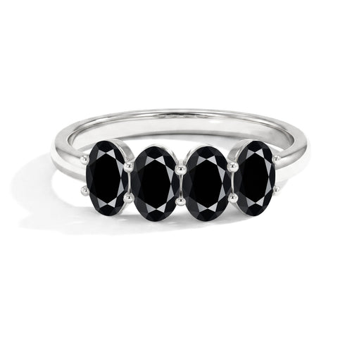 Elegant Black Onyx Four Stone Ring with Timeless Oval Gemstone Design