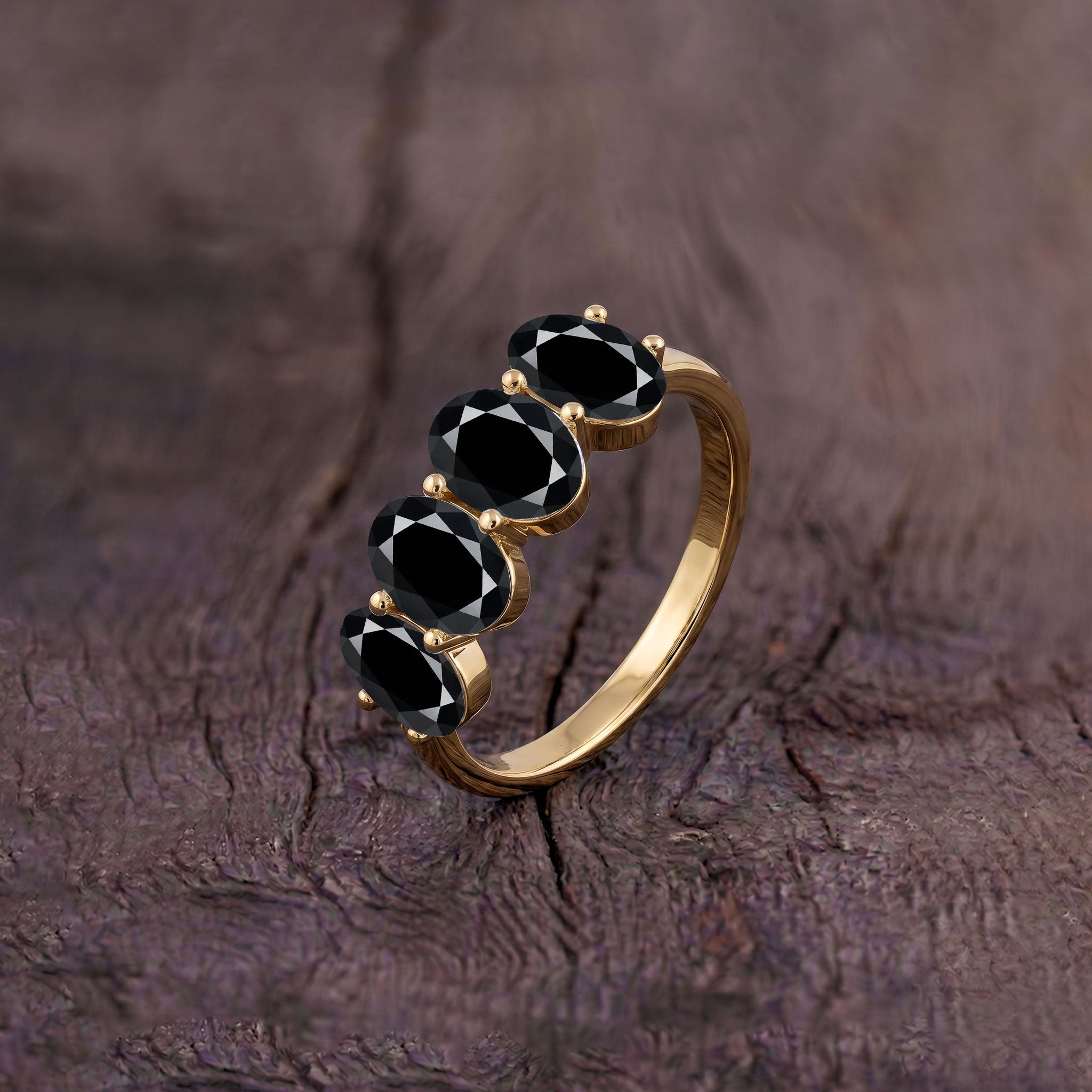 luxury black onyx ring, oval gemstone design, contemporary jewelry, handcrafted statement ring, elegant stacking band, polished black stones, fine accessory, modern jewelry, women's gift, classic ring