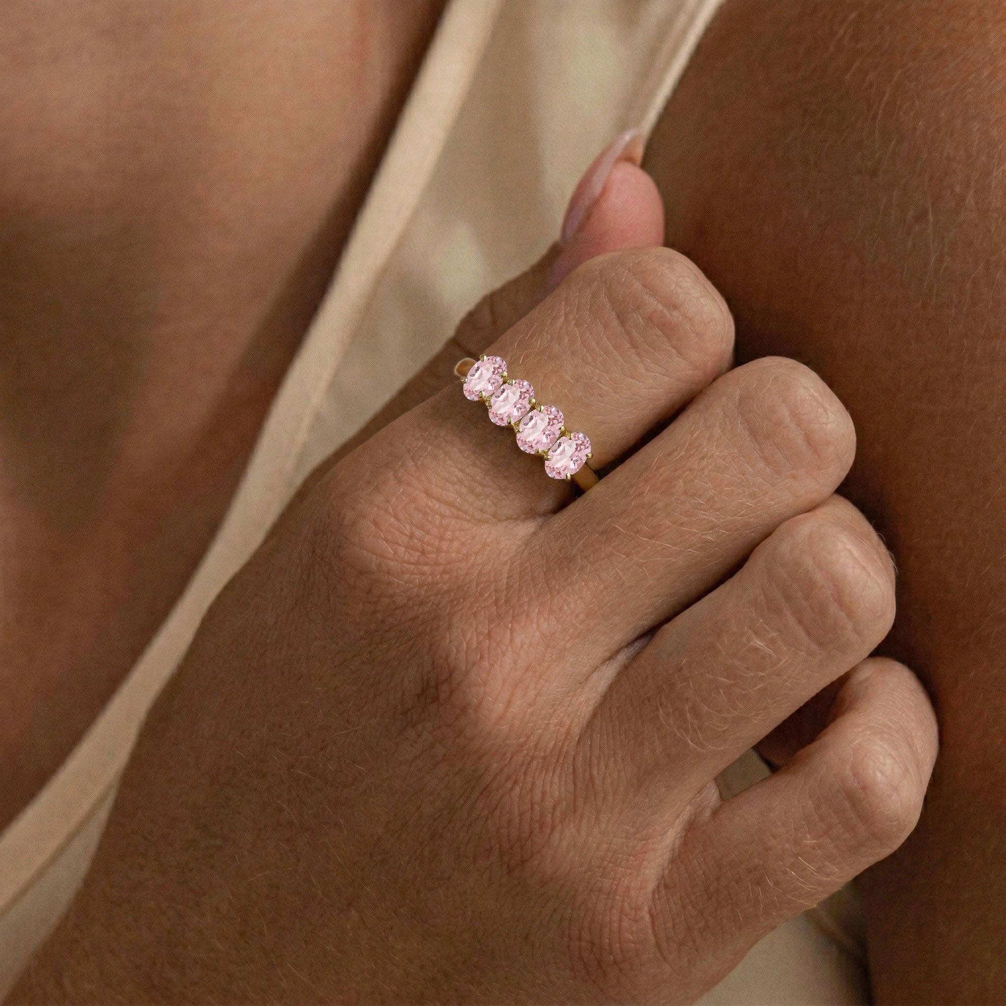 pink oval gemstone ring, four stone fashion ring, dainty jewelry, refined band, minimalist gemstone design, women's fine jewelry, anniversary present, everyday style, romantic jewelry, elegant accessory