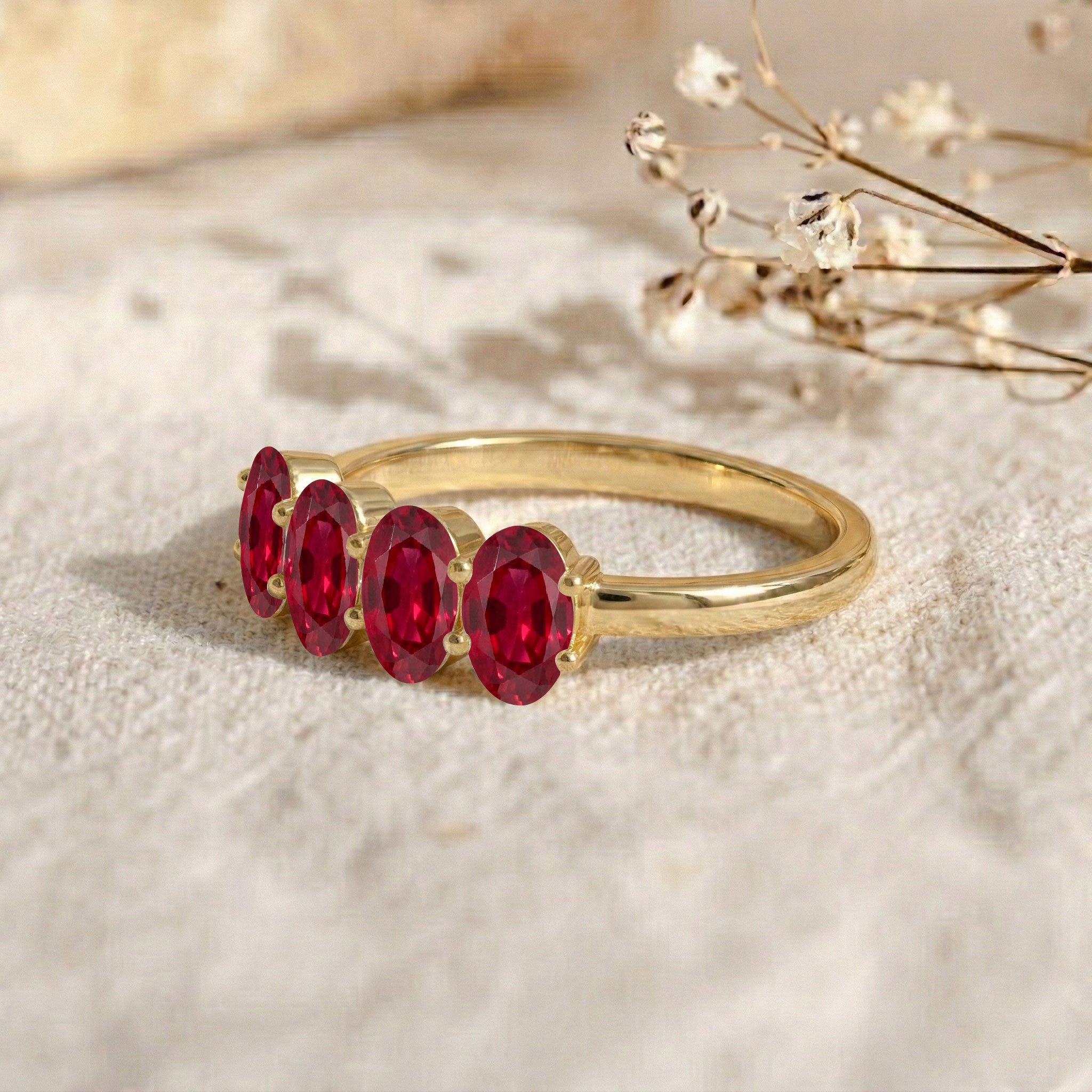 red gemstone jewelry, natural ruby band ring, elegant oval gemstone design, handcrafted women's accessory, polished sterling silver option, gold filled jewelry option, luxury fine ring, July gemstone gift, refined jewelry style, timeless ring