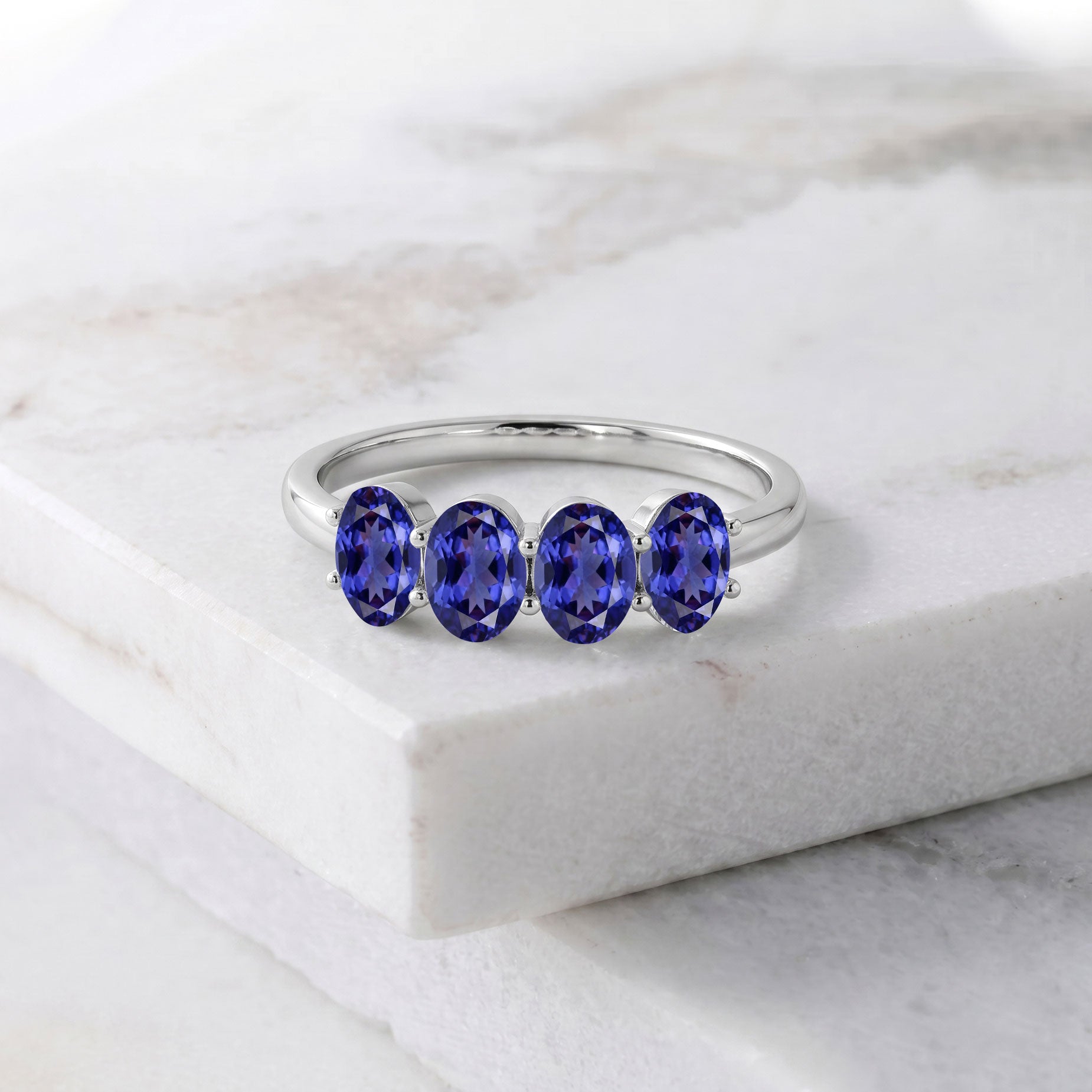 Genuine tanzanite gemstone ring, premium 14k yellow gold jewelry, boutique gemstone ring, exclusive designer jewelry, luxury fashion accessory, elegant women's ring, fine gemstone band, signature birthstone ring, handcrafted luxury, luxury statement ring