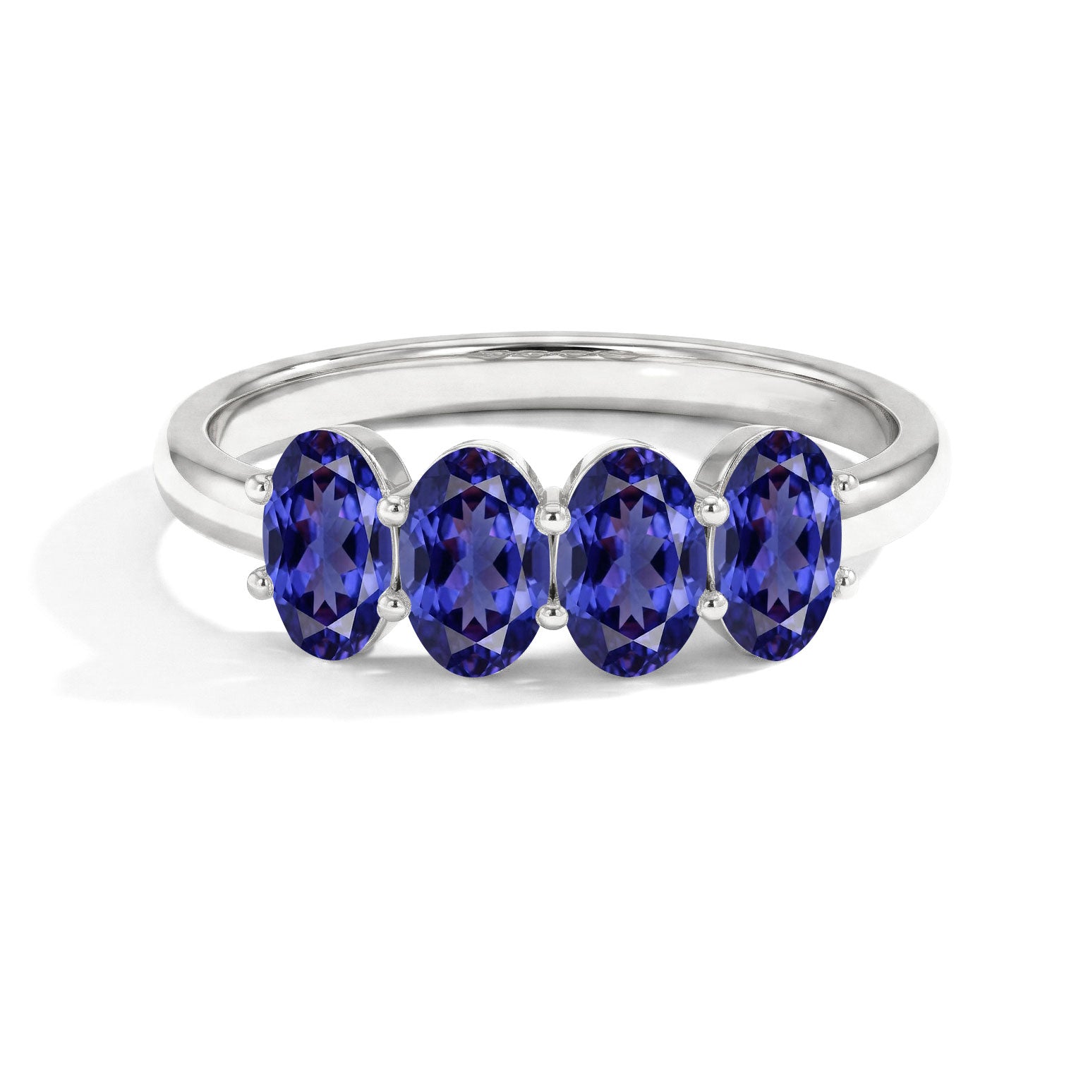 Custom tanzanite gemstone designer ring, premium gold jewelry, boutique stackable band, exclusive artisan jewelry, luxury fashion accessory, elegant women's ring, fine gemstone jewelry, signature ring design, handcrafted luxury, sophisticated statement ring