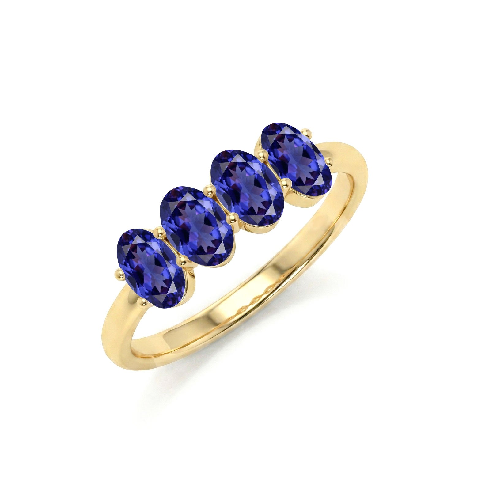 Four gemstone tanzanite designer ring, premium fine jewelry, boutique gemstone ring, exclusive artisan band, luxury fashion accessory, elegant women's ring, fine tanzanite jewelry, signature jewelry design, handcrafted luxury, sophisticated birthstone ring