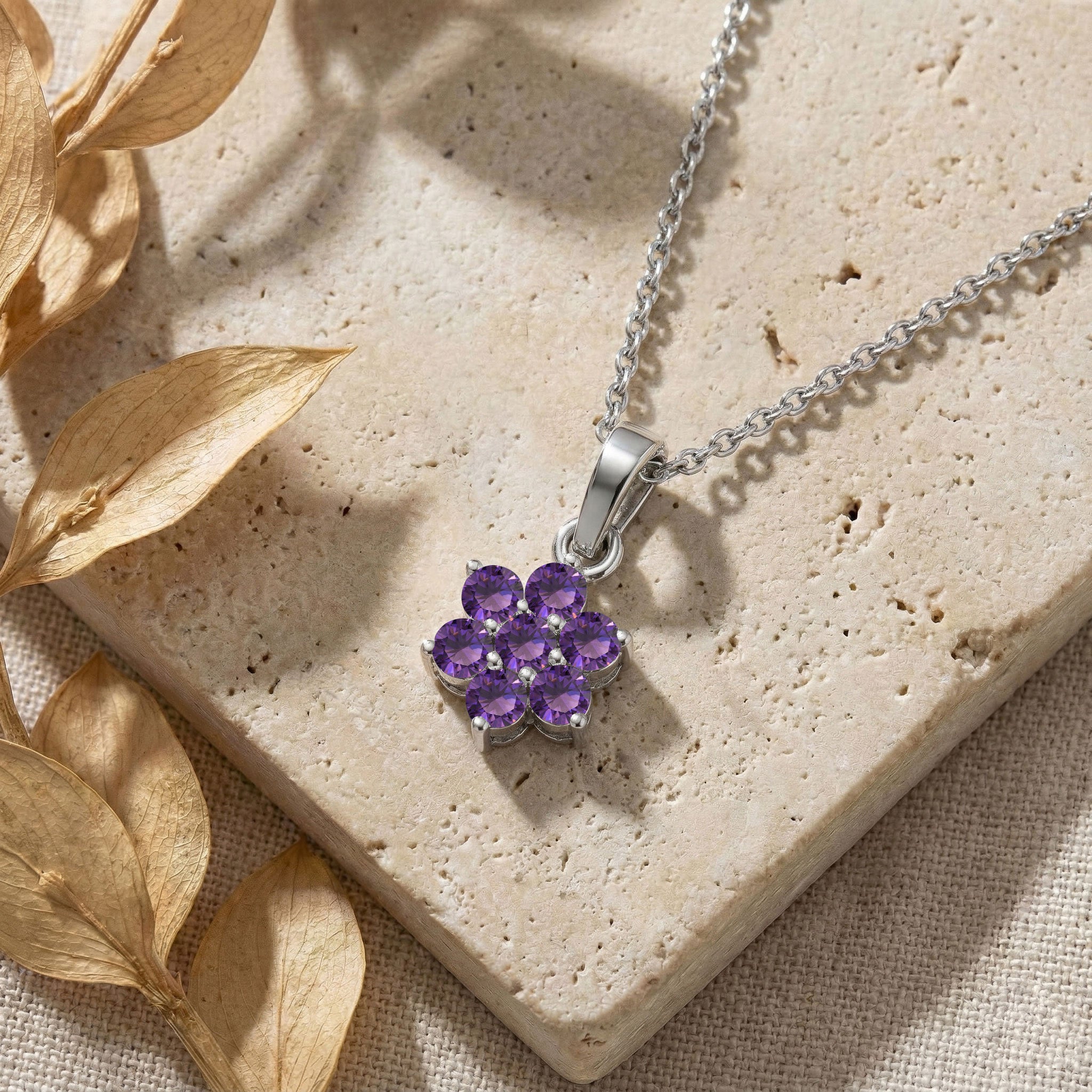 Elegant floral necklace featuring seven 3MM natural Amethyst gemstones in a sterling silver setting