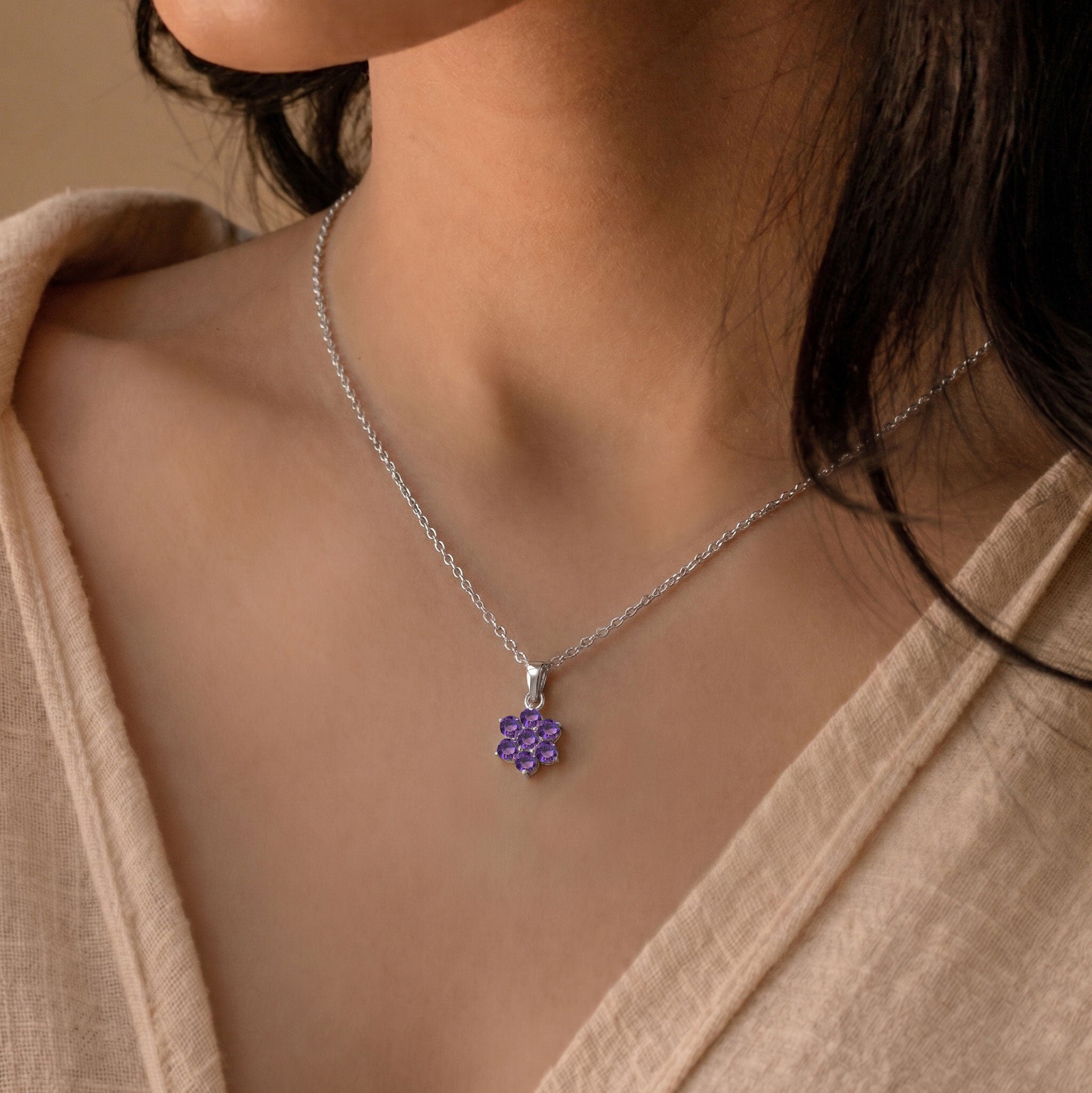 Dainty Amethyst gemstone necklace with a delicate flower pendant and adjustable chain