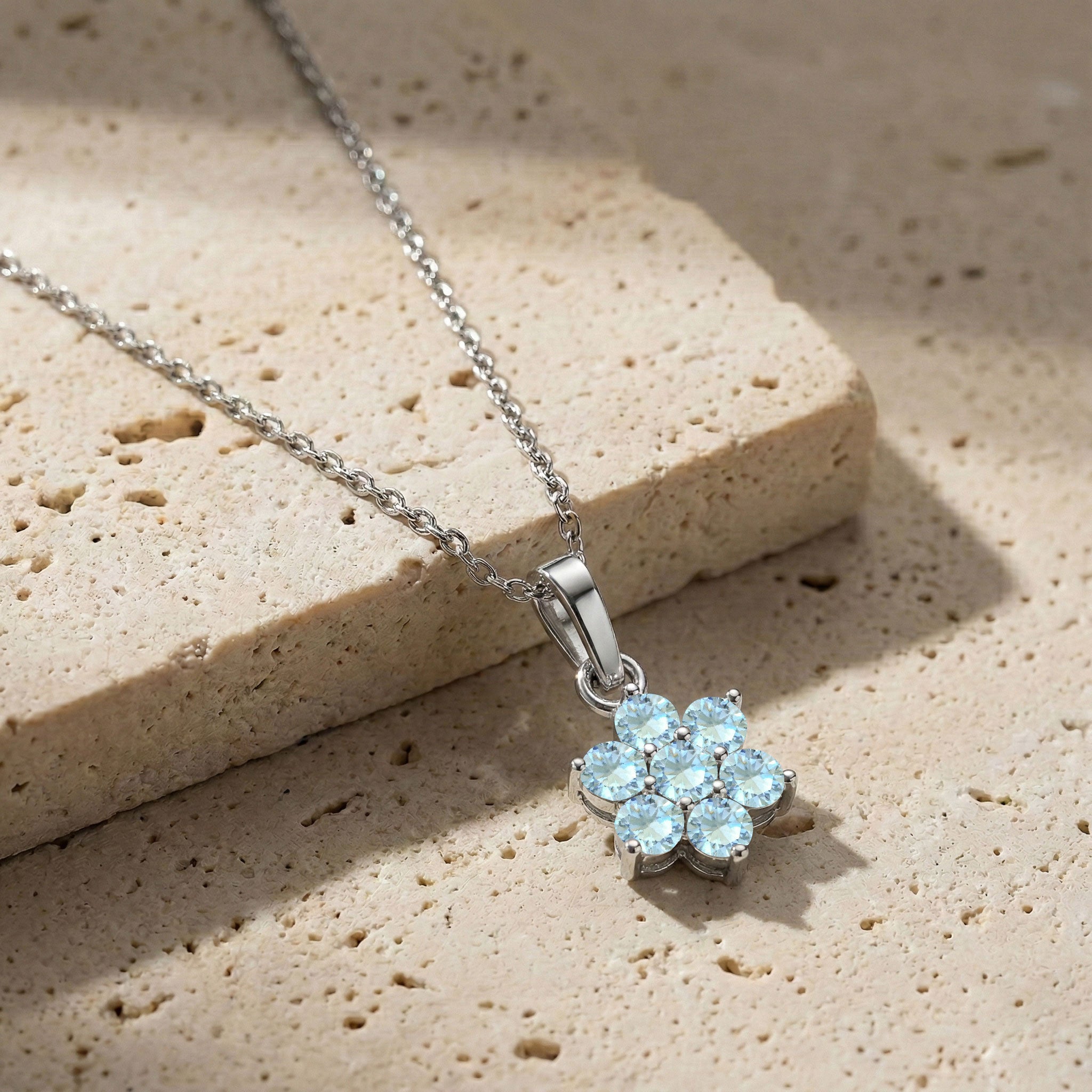 Elegant Aquamarine floral pendant necklace for women with 3MM round gemstones.
