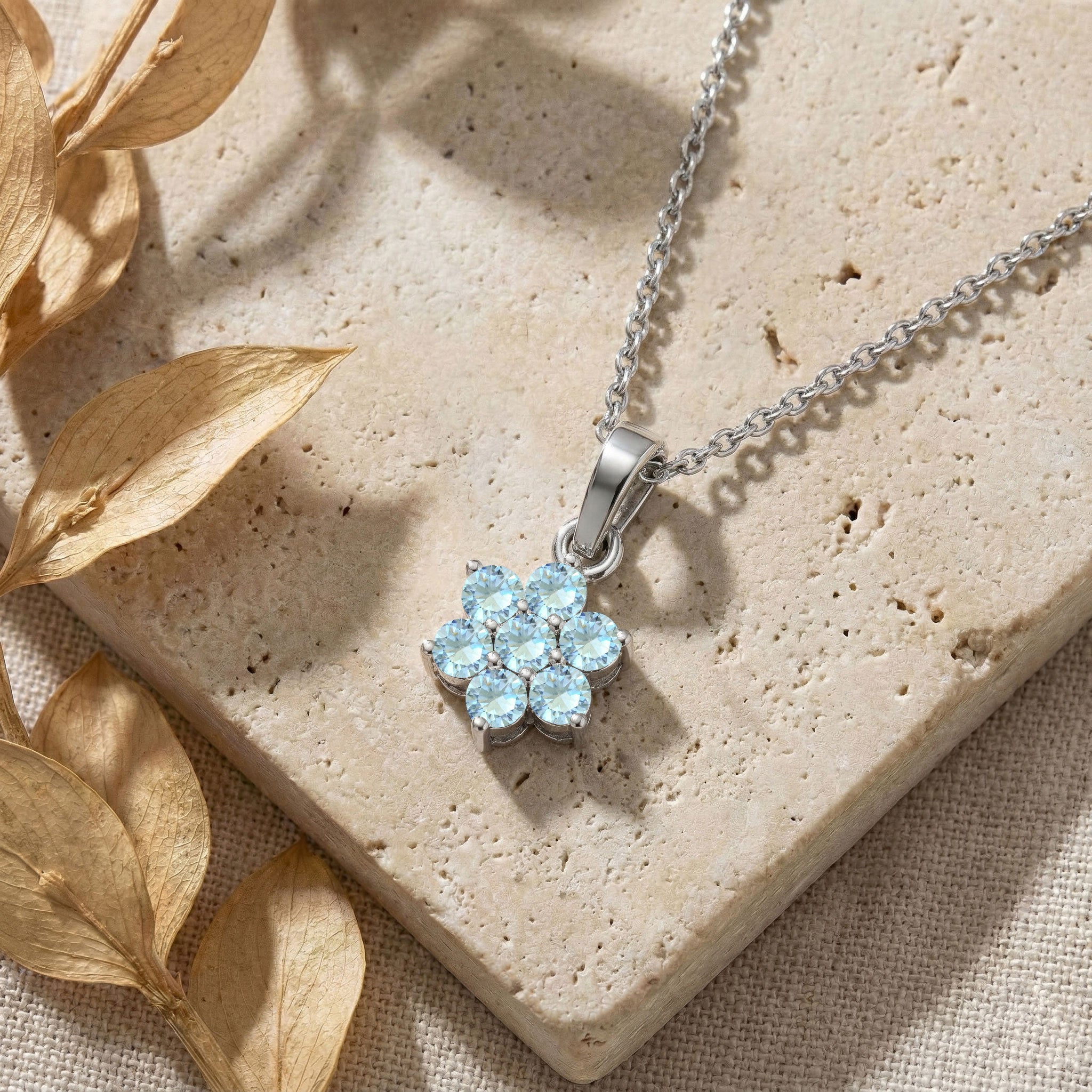 Floral Aquamarine pendant necklace featuring beautiful ocean-blue gemstones for women.