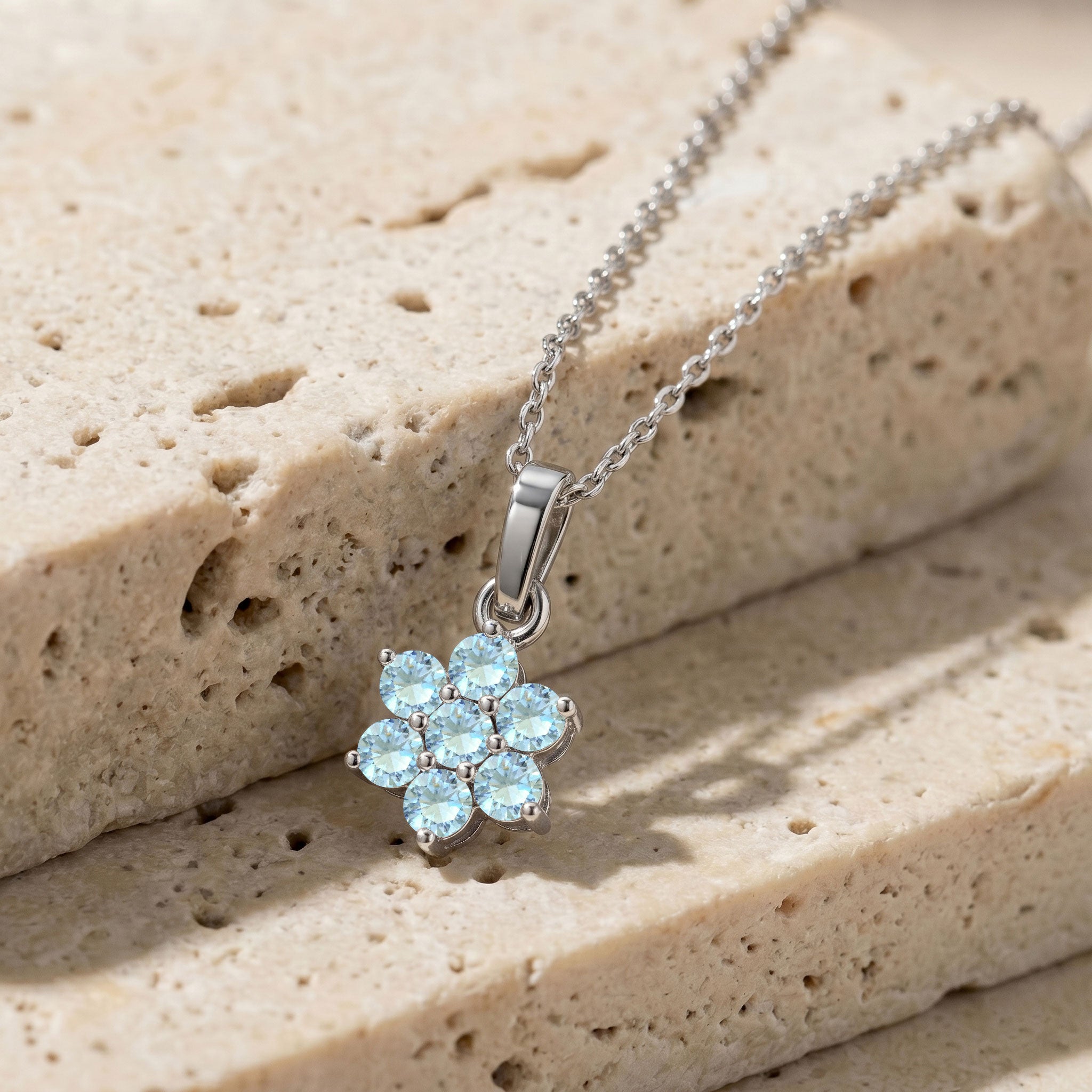 Handmade Aquamarine flower pendant necklace crafted in premium sterling silver.