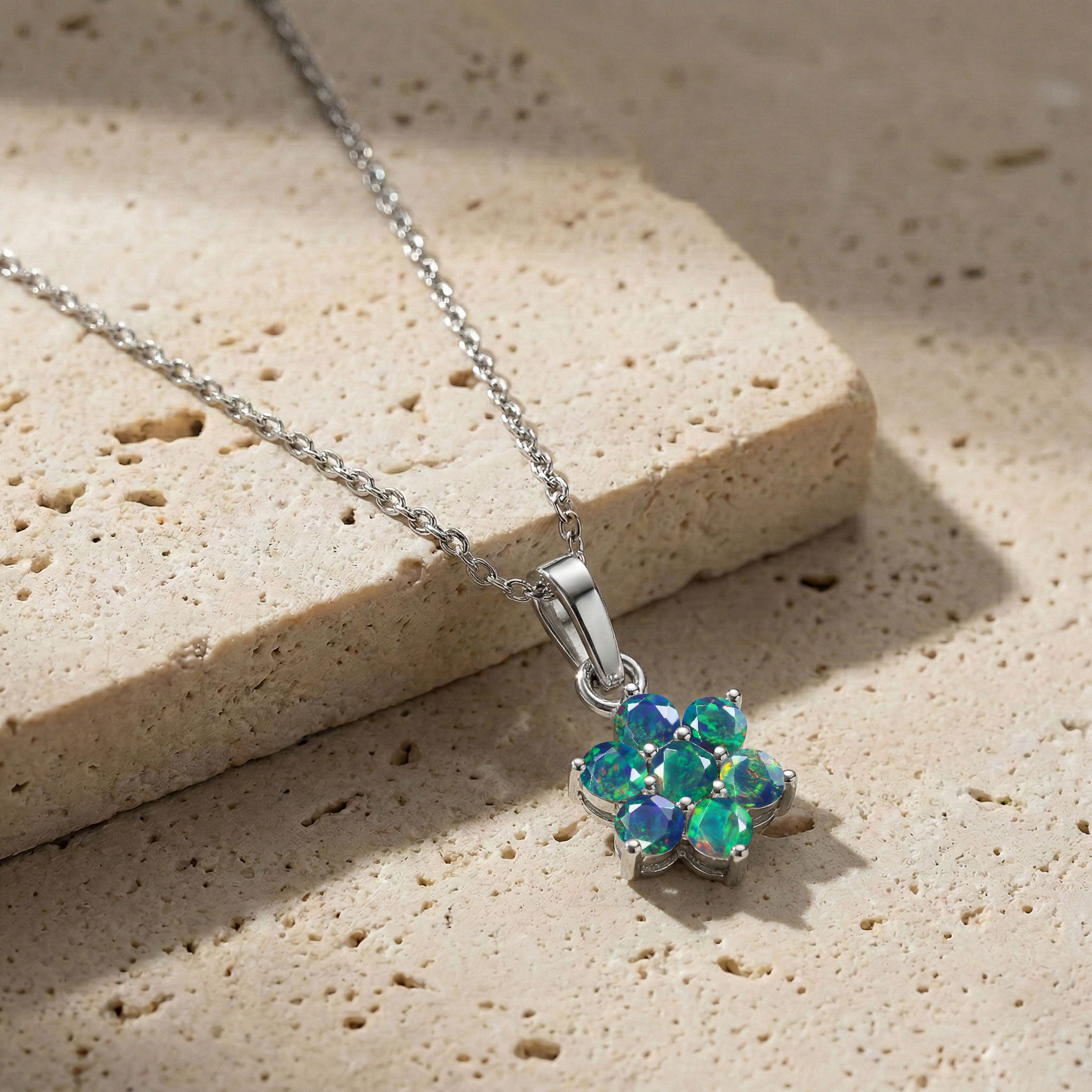Elegant Black Opal floral pendant necklace with 3MM round gemstone design.