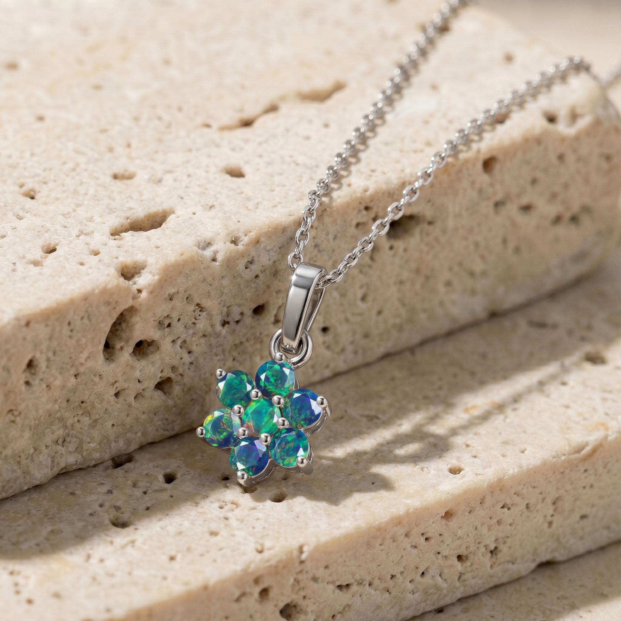 Floral Black Opal pendant necklace featuring beautiful dark gemstone details.