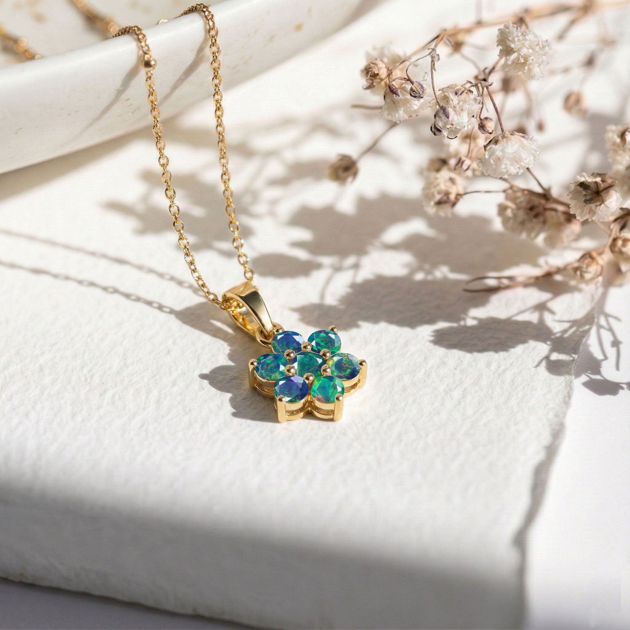 
Women's Black Opal necklace available in Sterling Silver and Yellow Gold Filled.