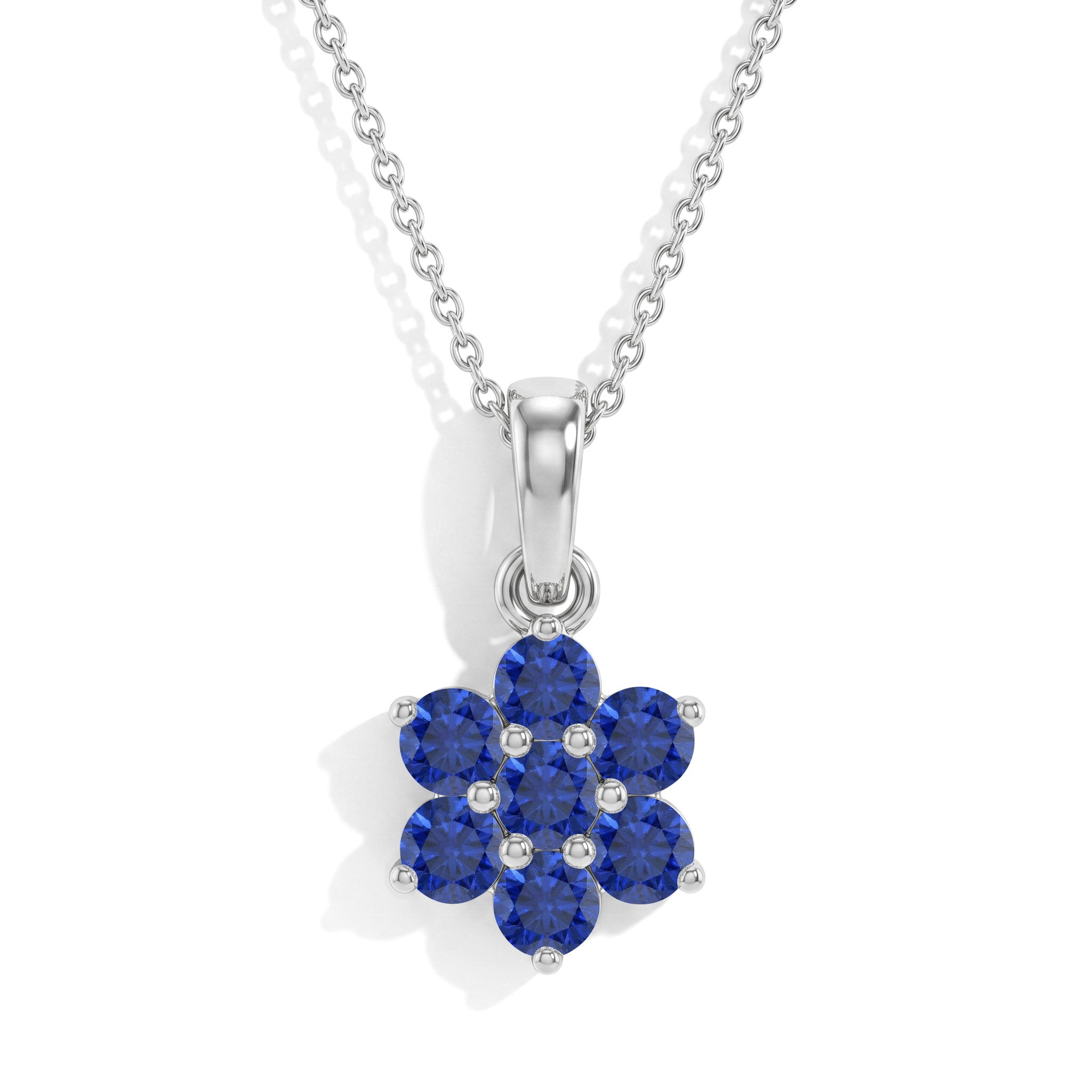 "Blue Sapphire flower pendant necklace in 925 Sterling Silver featuring seven round gemstones.