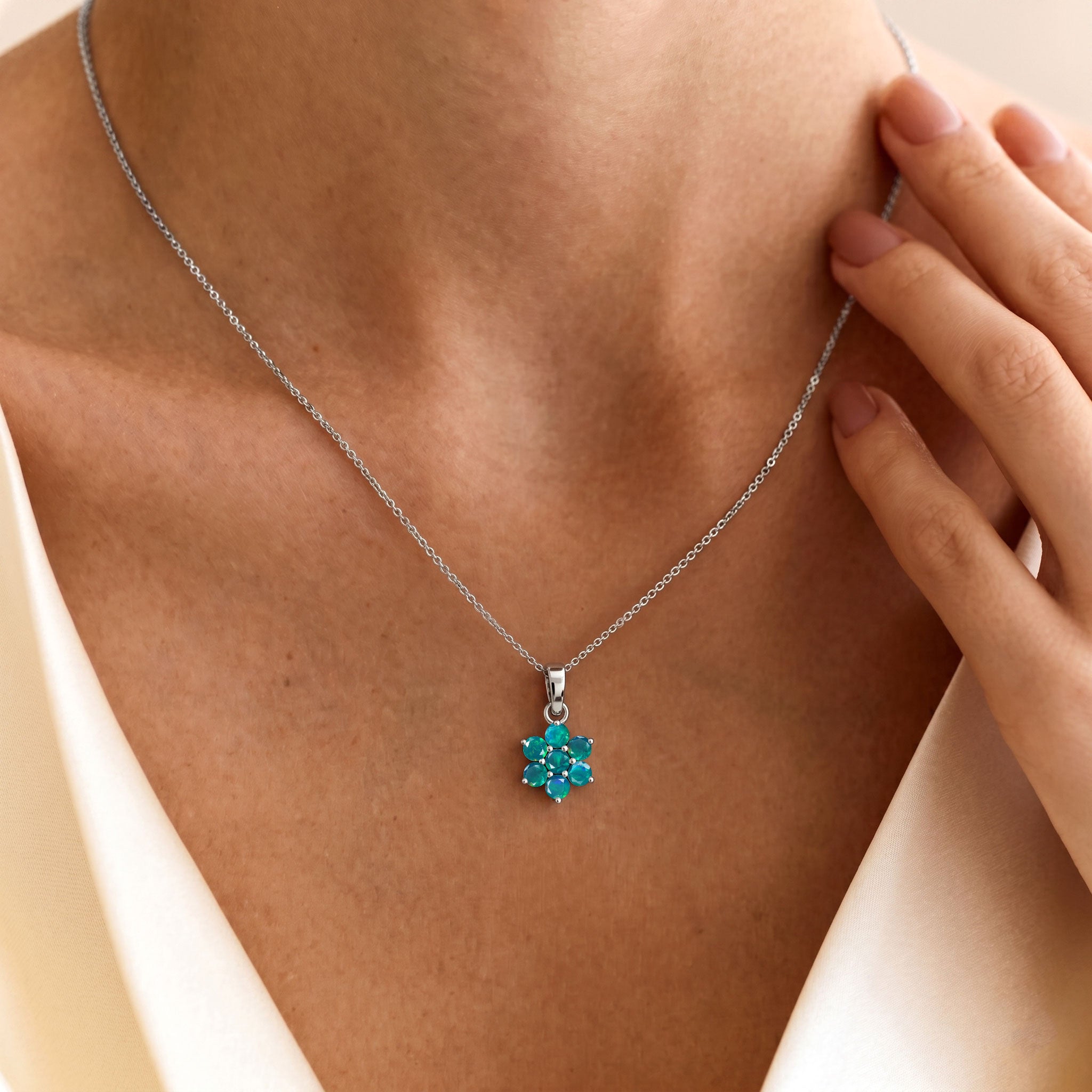 Dainty green opal pendant necklace with delicate flower charm design