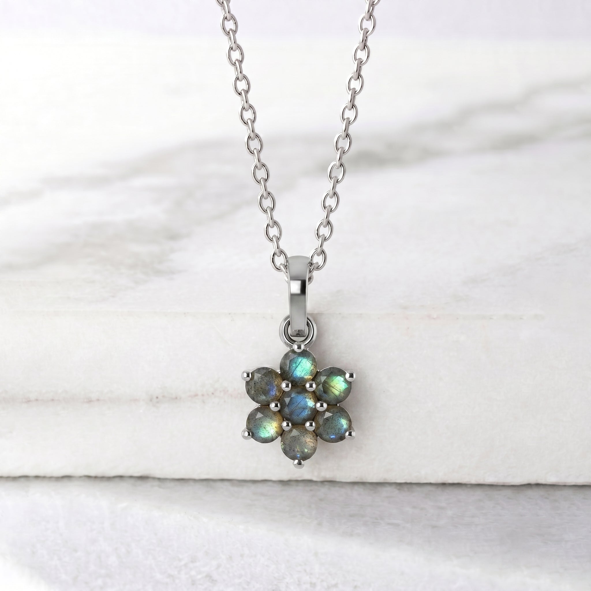 Floral gemstone necklace featuring seven round labradorite stones