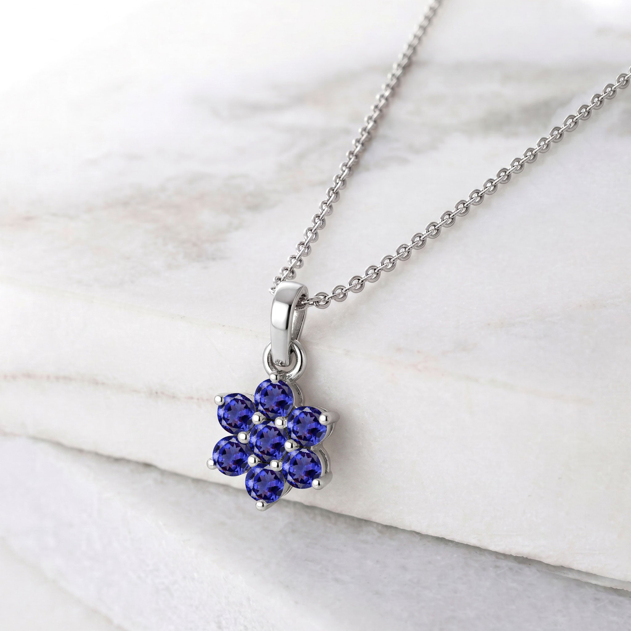 Sterling silver tanzanite necklace with yellow gold filled accents and elegant design