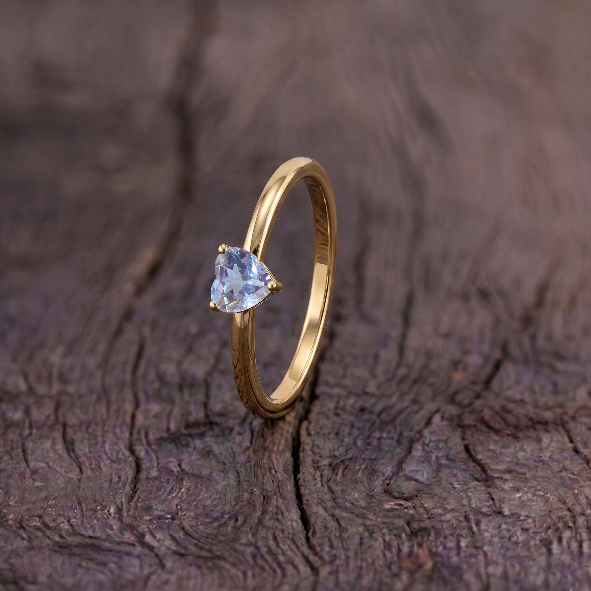 alexandrite heart gemstone ring, handcrafted women's jewelry, elegant solitaire design, artisan gemstone craftsmanship, june birthstone jewelry, promise ring style, anniversary keepsake, birthday jewelry, fine gemstone accessory, timeless elegance, polished craftsmanship, romantic jewelry gift, classic fashion ring, premium quality, minimalist design