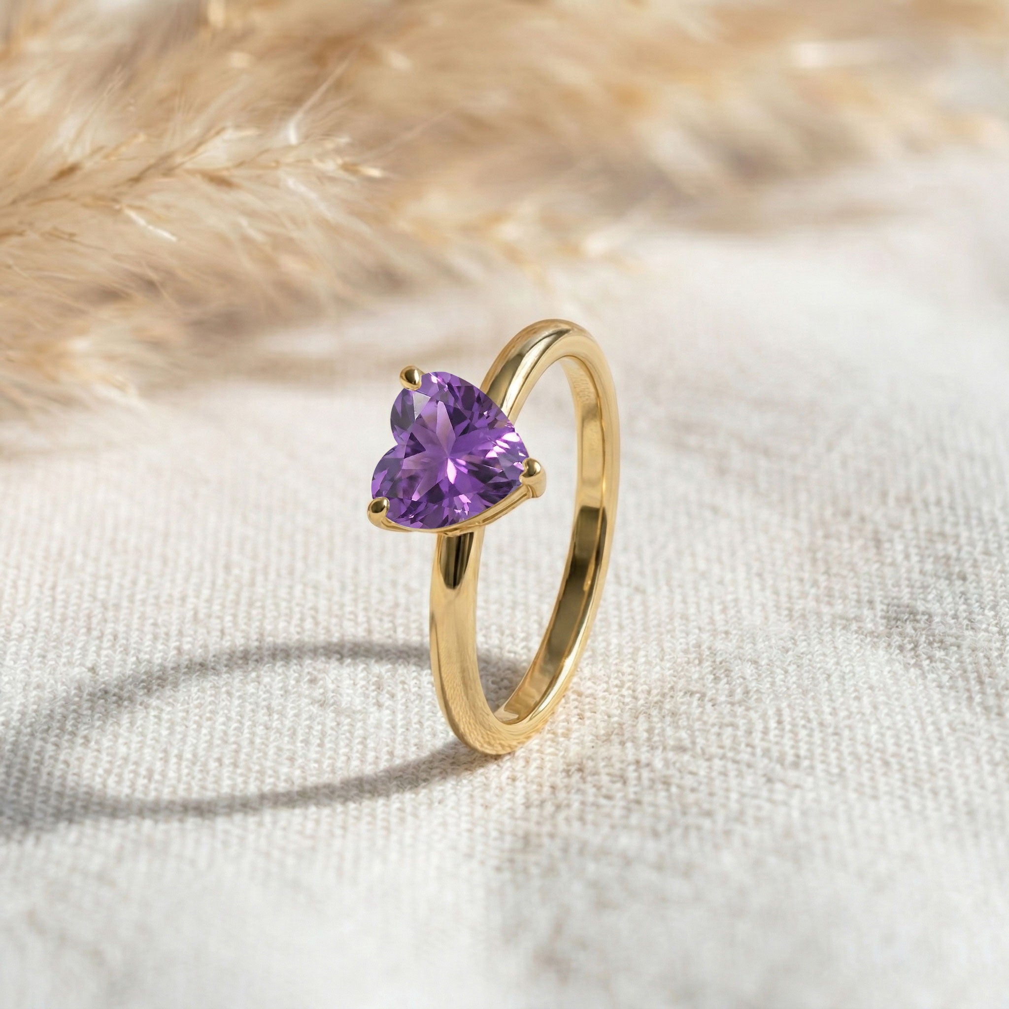 heart shaped amethyst solitaire, natural gemstone jewelry, purple crystal ring, february birthstone keepsake, sterling silver jewelry, yellow gold filled selection, elegant gift for women, romantic gemstone design, handcrafted fine jewelry, delicate fashion accessory, everyday wear ring, minimalist elegance
