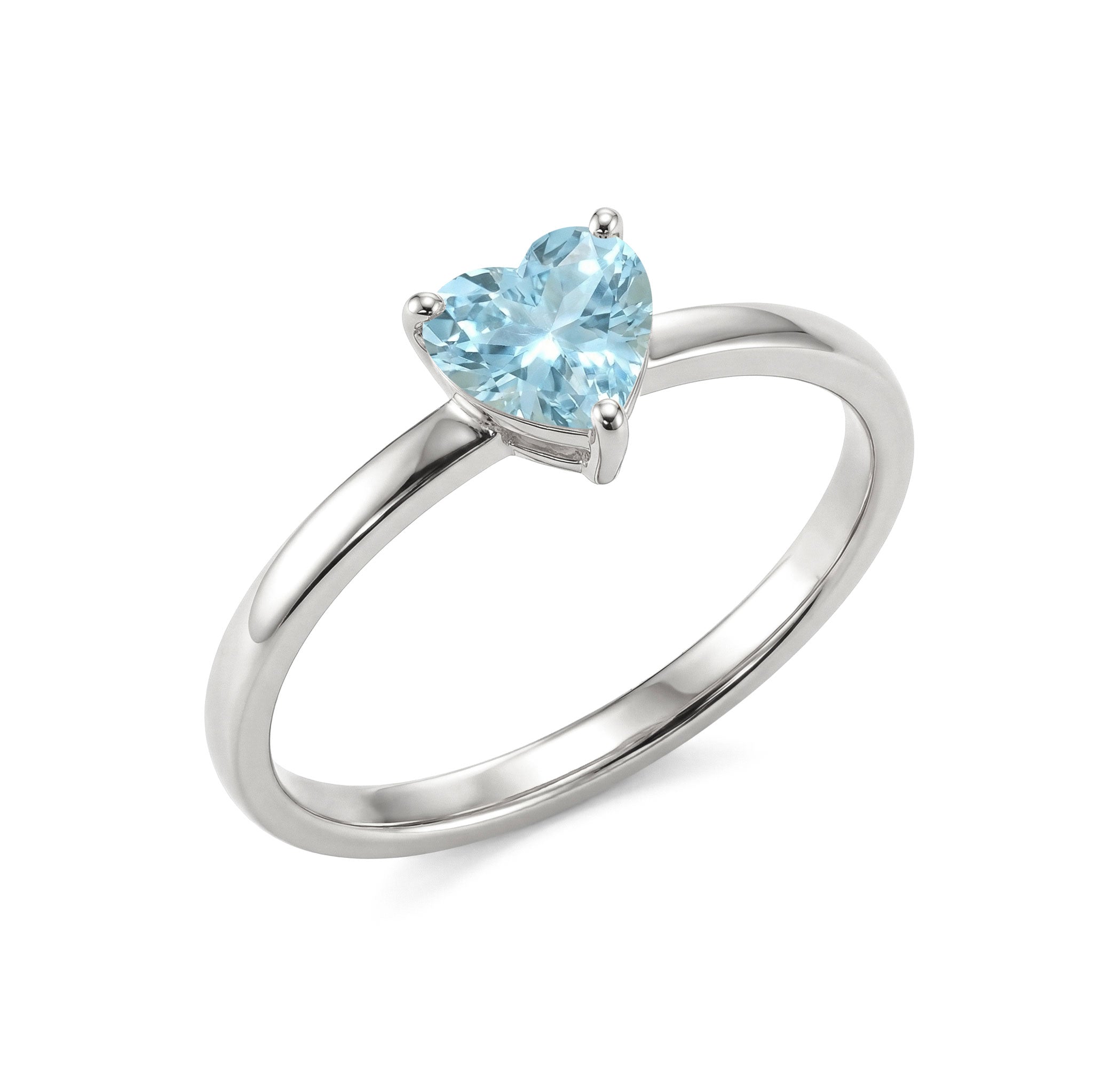 Aquamarine gemstone heart ring, delicate solitaire jewelry, women's blue birthstone accessory, March birthday gift, polished jewelry design, minimalist promise ring, artisan crafted gemstone, elegant fashion accessory, romantic jewelry, stacking ring style, luxury fine jewelry, timeless elegance, bridal gift, handcrafted ring, feminine style