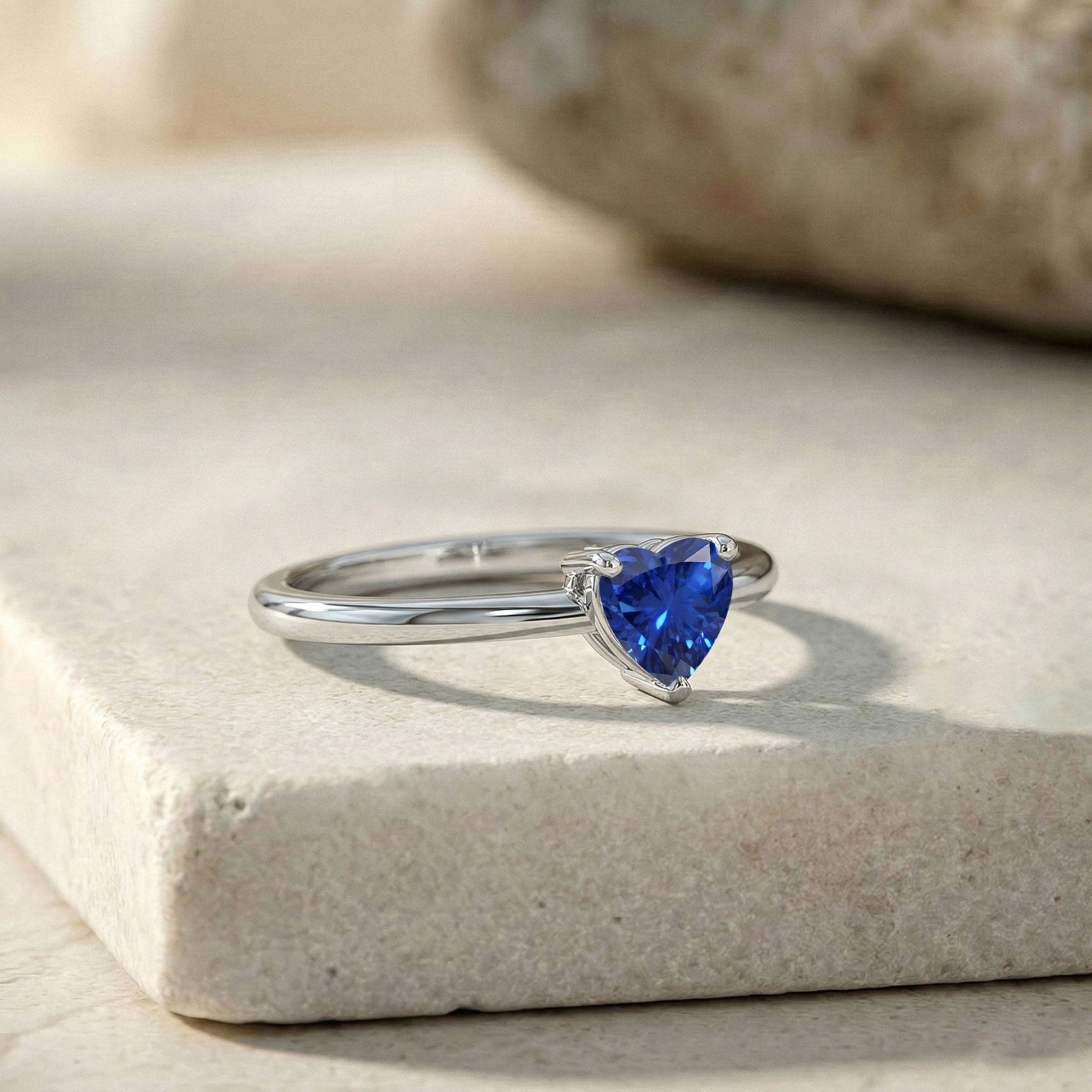 heart sapphire jewellery, solitaire gemstone ring, handcrafted artisan ring, september gemstone jewellery, sterling silver fashion ring, gold filled band, women's elegant accessory, engagement style ring, blue gemstone sparkle, romantic keepsake, timeless jewellery, fine ring gift, polished finish, minimalist elegance, handmade jewellery