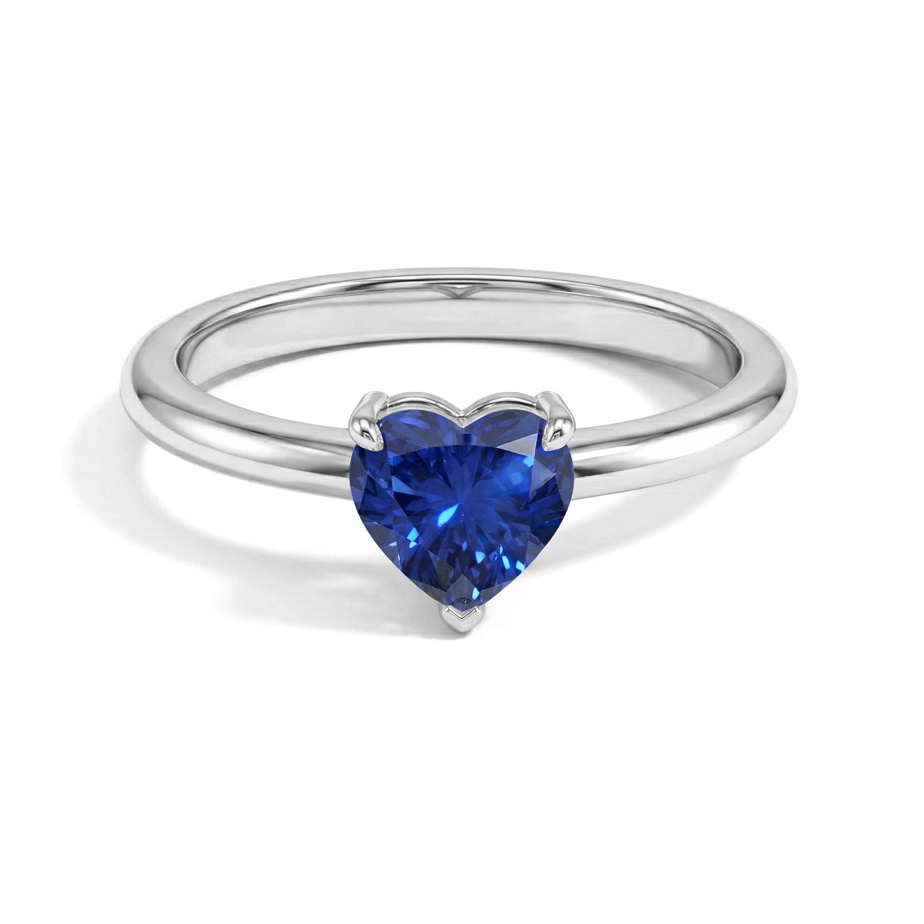 blue sapphire heart ring, heart solitaire ring, september birthstone ring, sterling silver heart jewellery, yellow gold filled ring, heart cut gemstone, romantic promise ring, engagement jewellery, handmade sapphire ring, gift for her, elegant solitaire design, fine jewellery, minimalist heart ring, anniversary gift, women's fashion jewellery