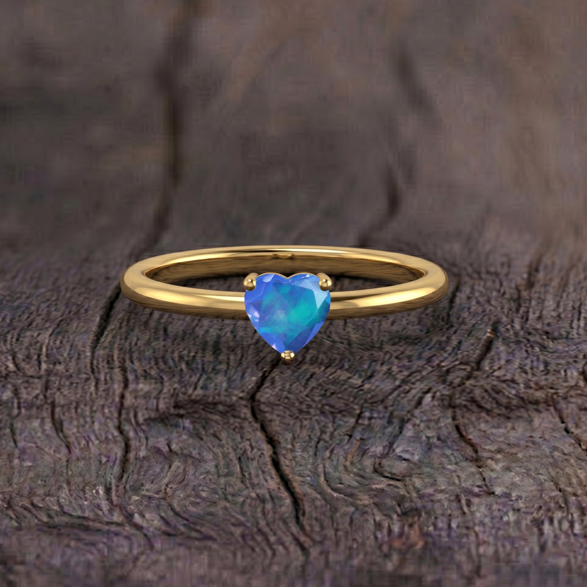 Natural Blue Opal jewelry, heart shaped gemstone, classic solitaire ring, blue gemstone accessory, fine gemstone jewelry, anniversary gift ring, birthday jewelry, elegant women's ring, polished finish ring, heart solitaire design, timeless jewelry, minimalist style, gift idea, handcrafted jewelry, luxury accessory