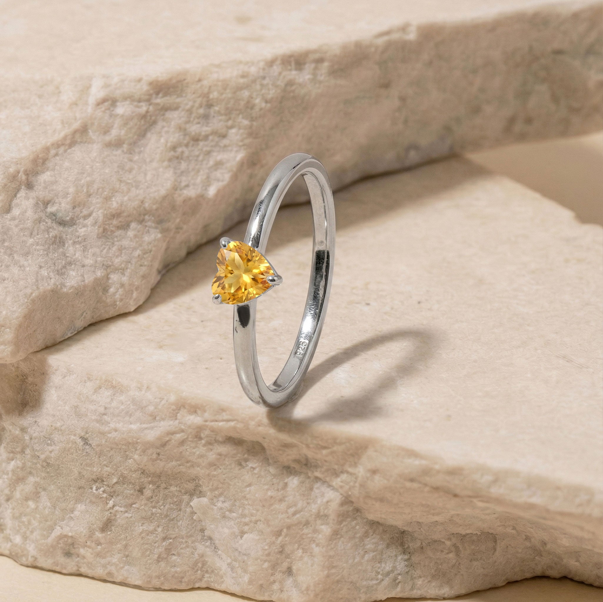 fine citrine gemstone ring, heart cut jewelry gift, handmade solitaire jewelry, november gemstone ring, romantic jewelry, classic gemstone accessory, everyday luxury jewelry, women's elegant ring, artisan craftsmanship, refined fashion jewelry, minimalist elegance, polished ring, beautiful gemstone, timeless fashion, special gift